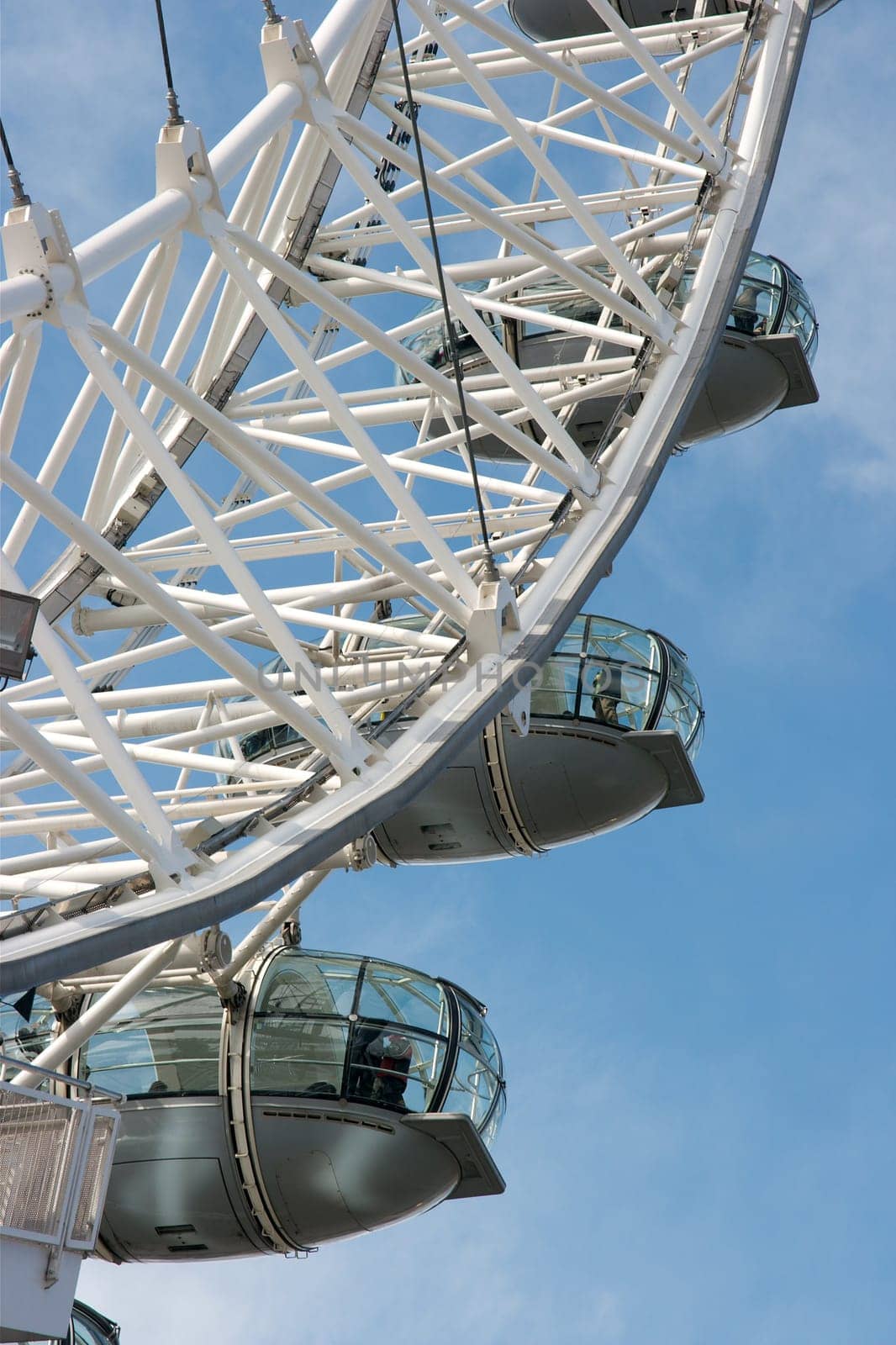 Detail of the London Eye against blue sky
