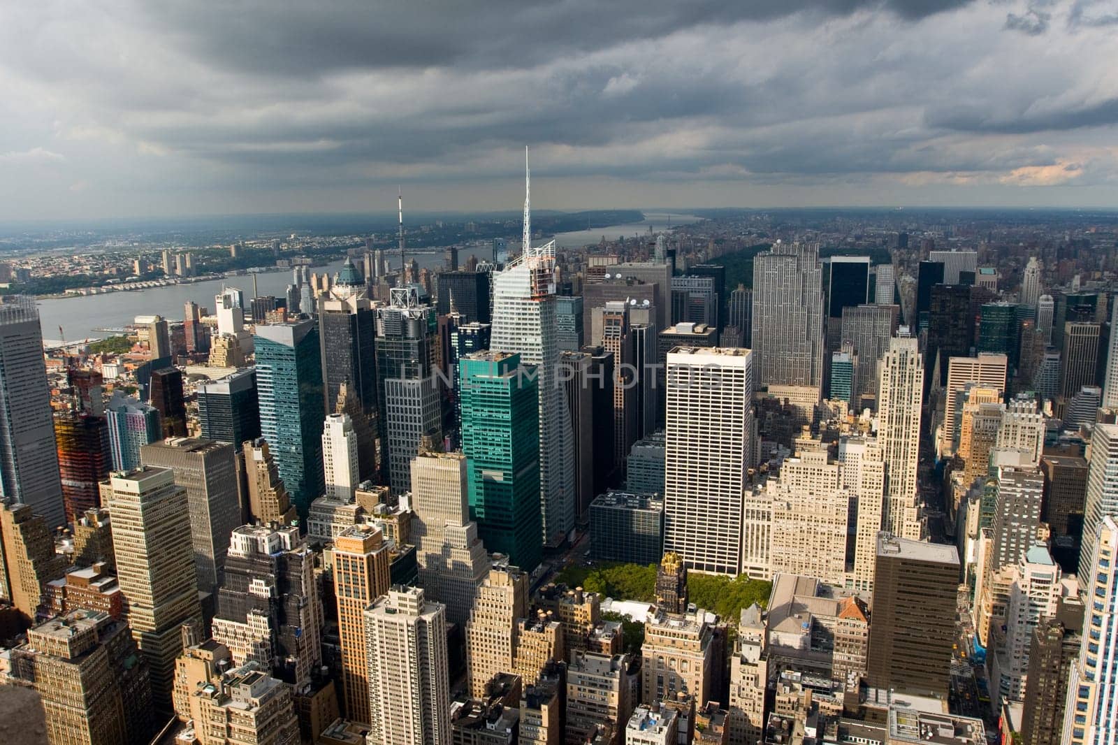 Skyline of New York City under the sun when the rain is comming.