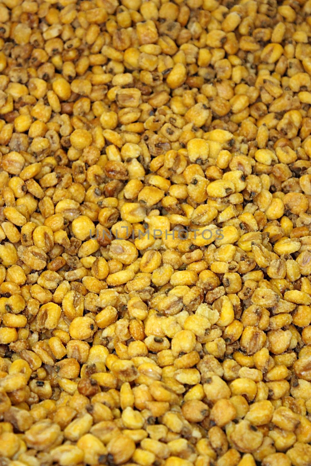 Corn with salty sauce background