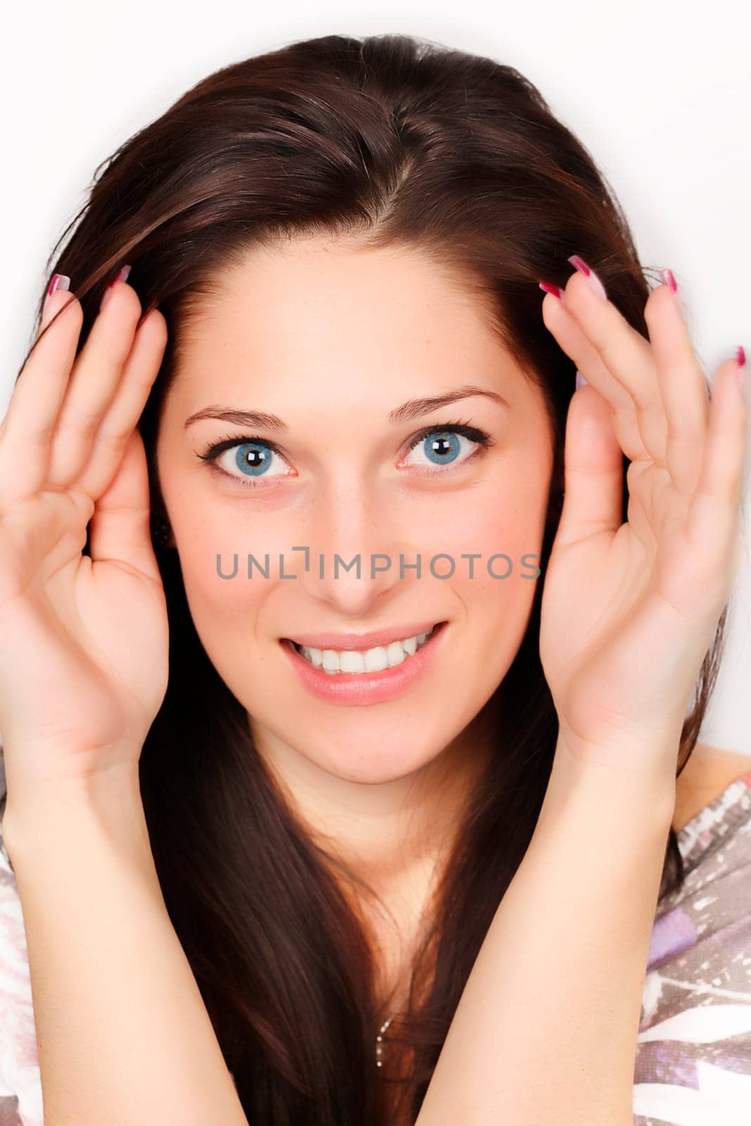 Portrait of a smiling young woman with black hair