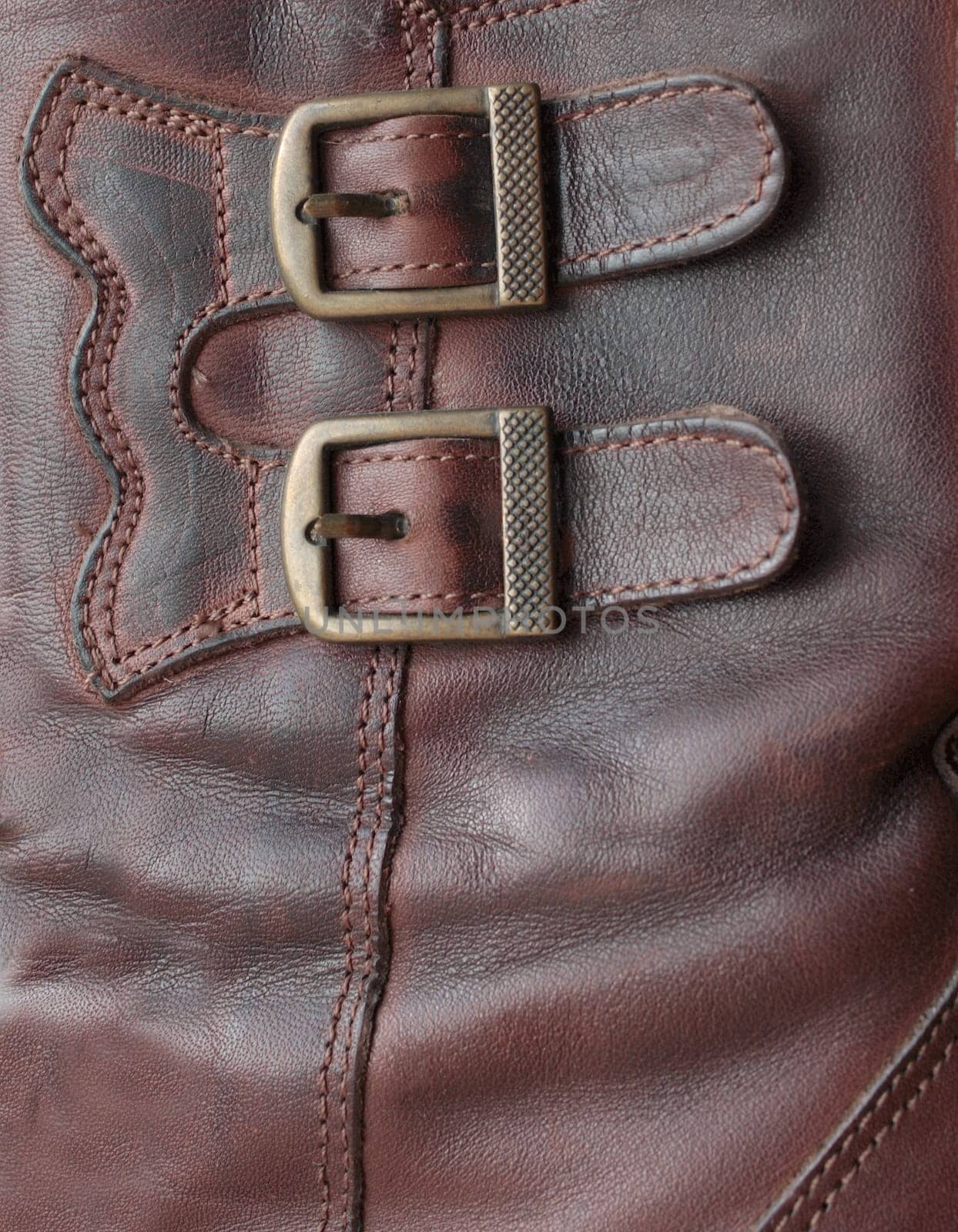 Two metal buckles on a product from a leather
