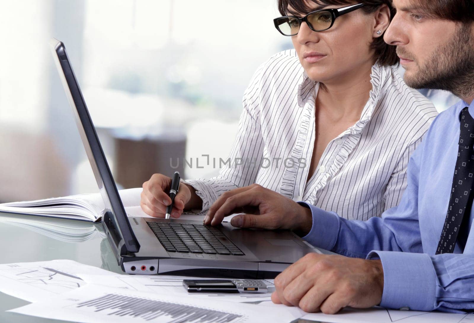 two business people working seriously