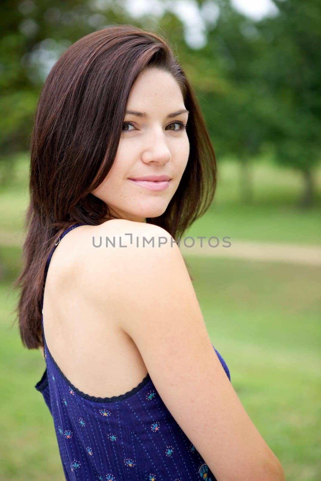 A Fresh Faced Girl With a beautiful face and green background