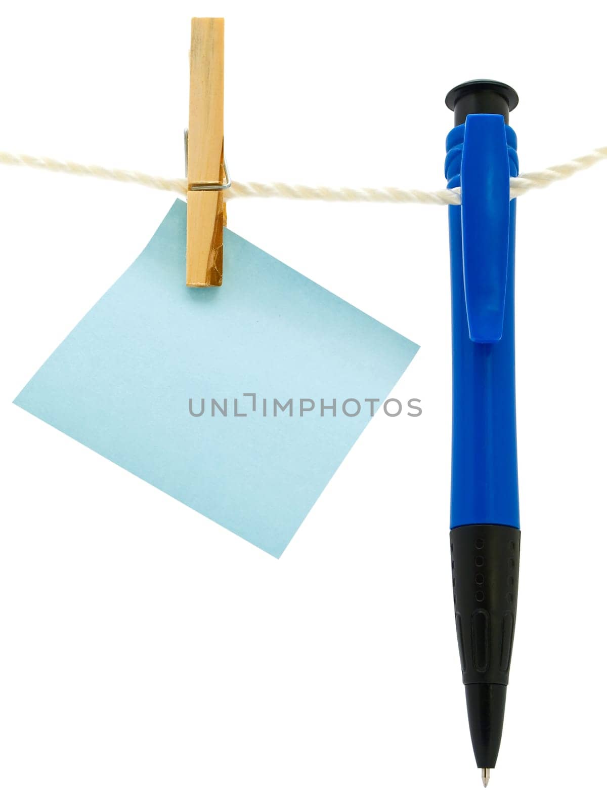 blue blank note and ballpoint at the peg against white background