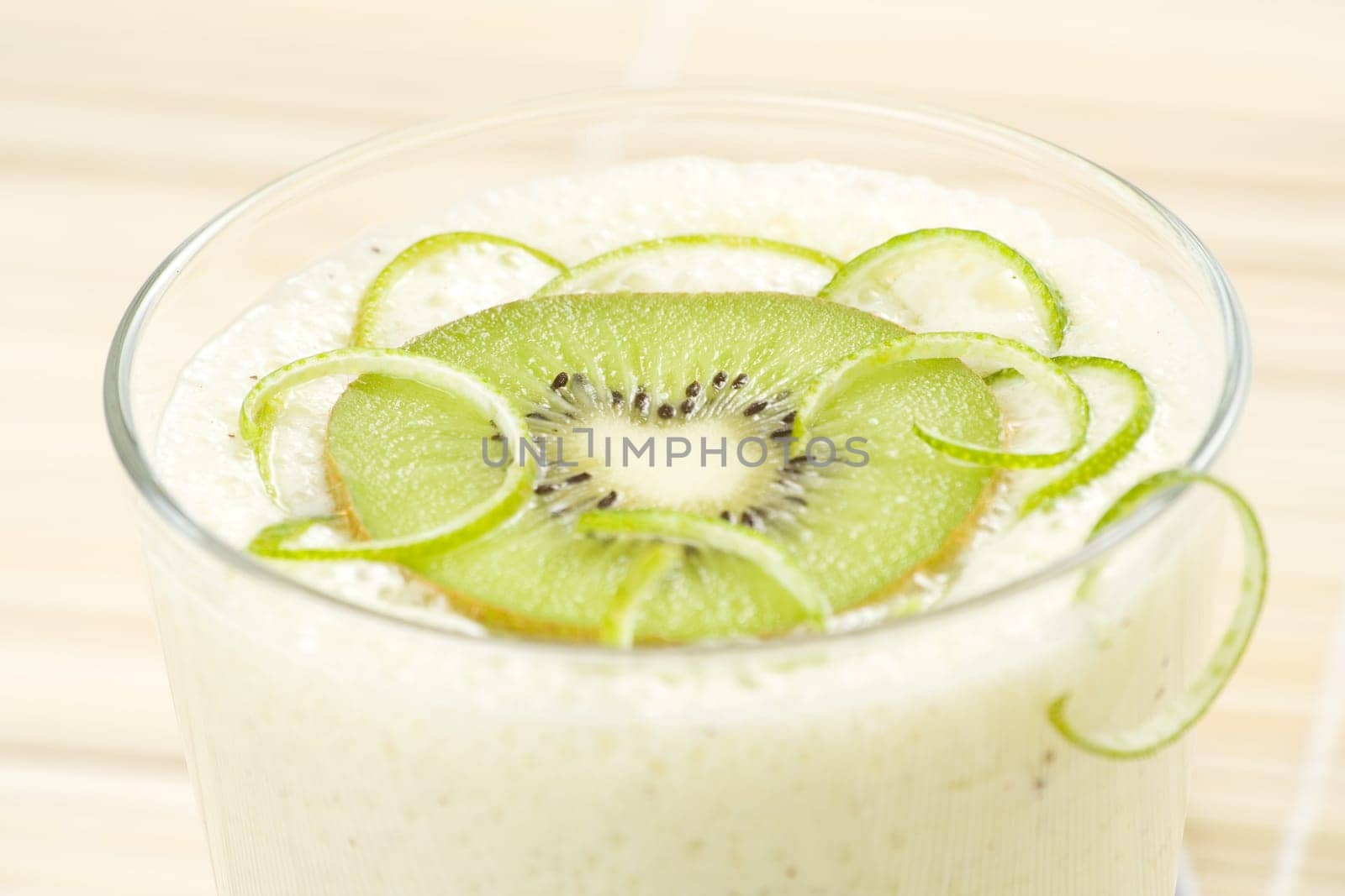 refreshment and creamy milkshake  kiwi and lime isolated