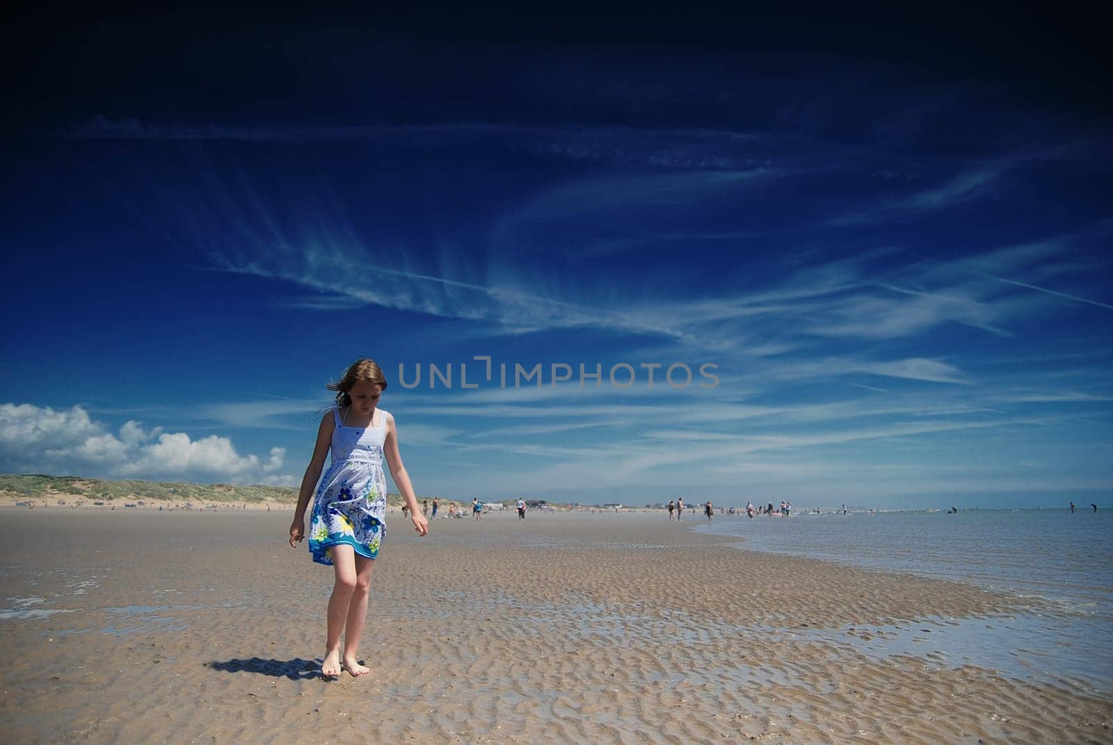 Young girl having fun on the beach