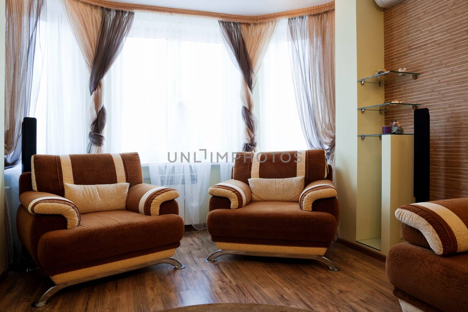 two beautiful chairs in a modern apartment