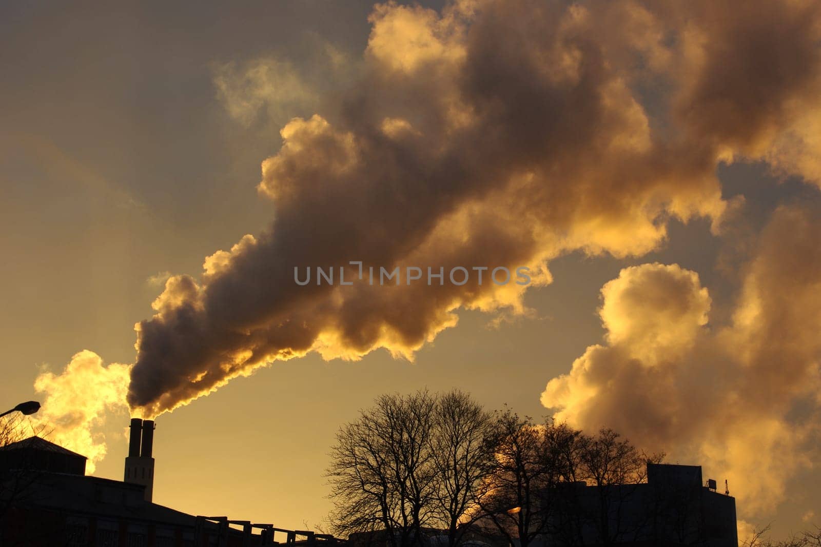 Dirty air pollution with a sunset on the background