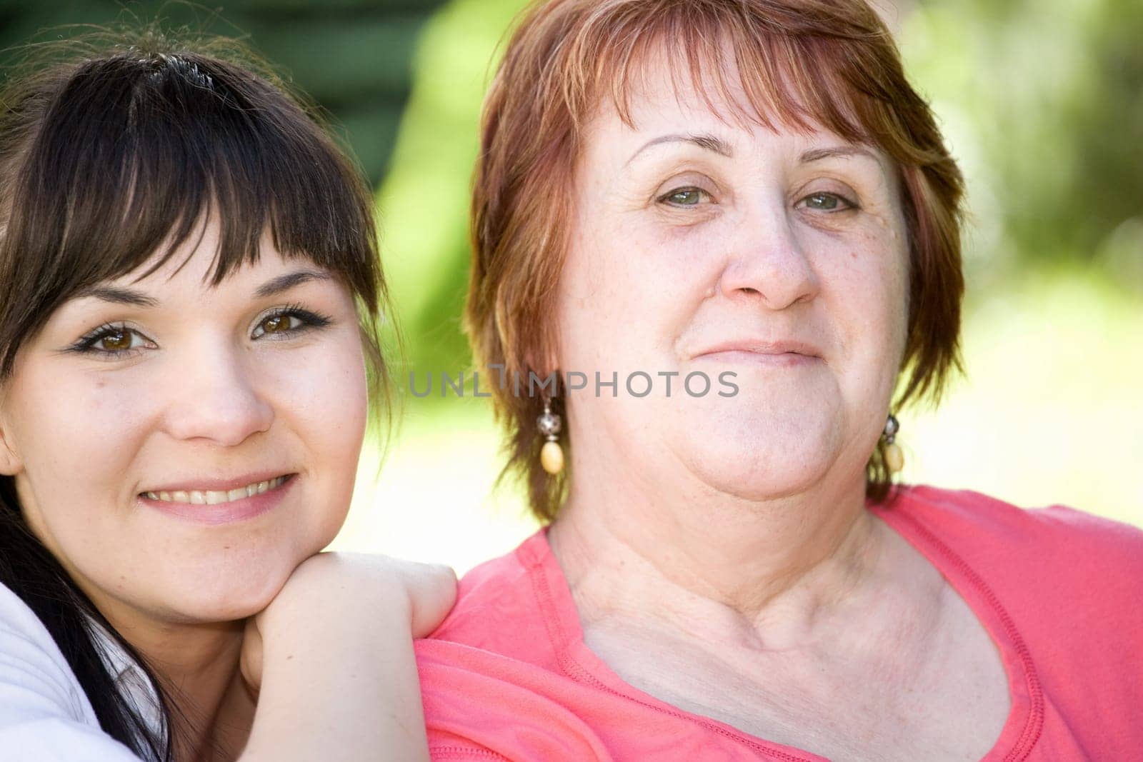 happy family relaxing together in park