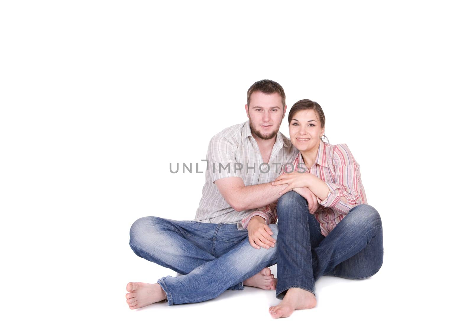 happy young couple together on white background