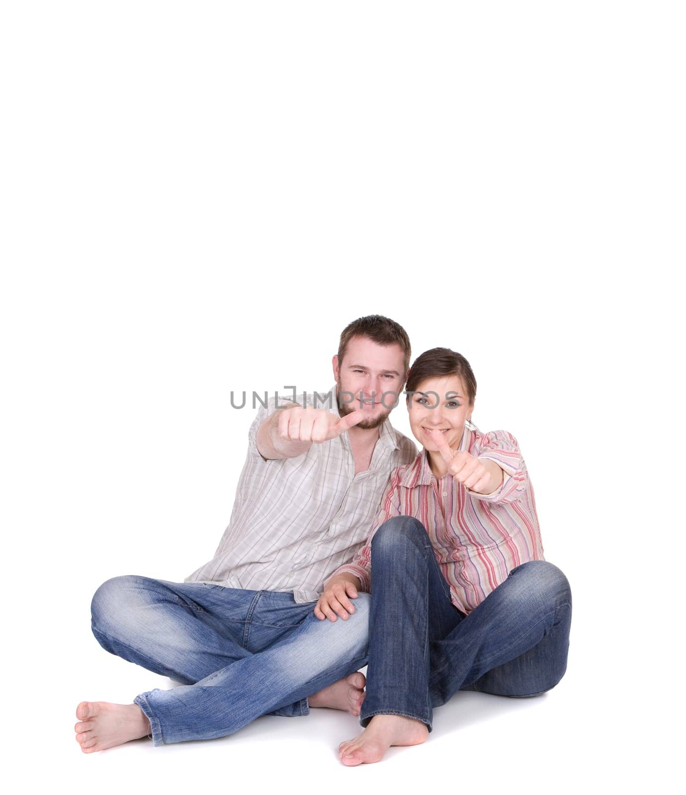happy young couple together on white background