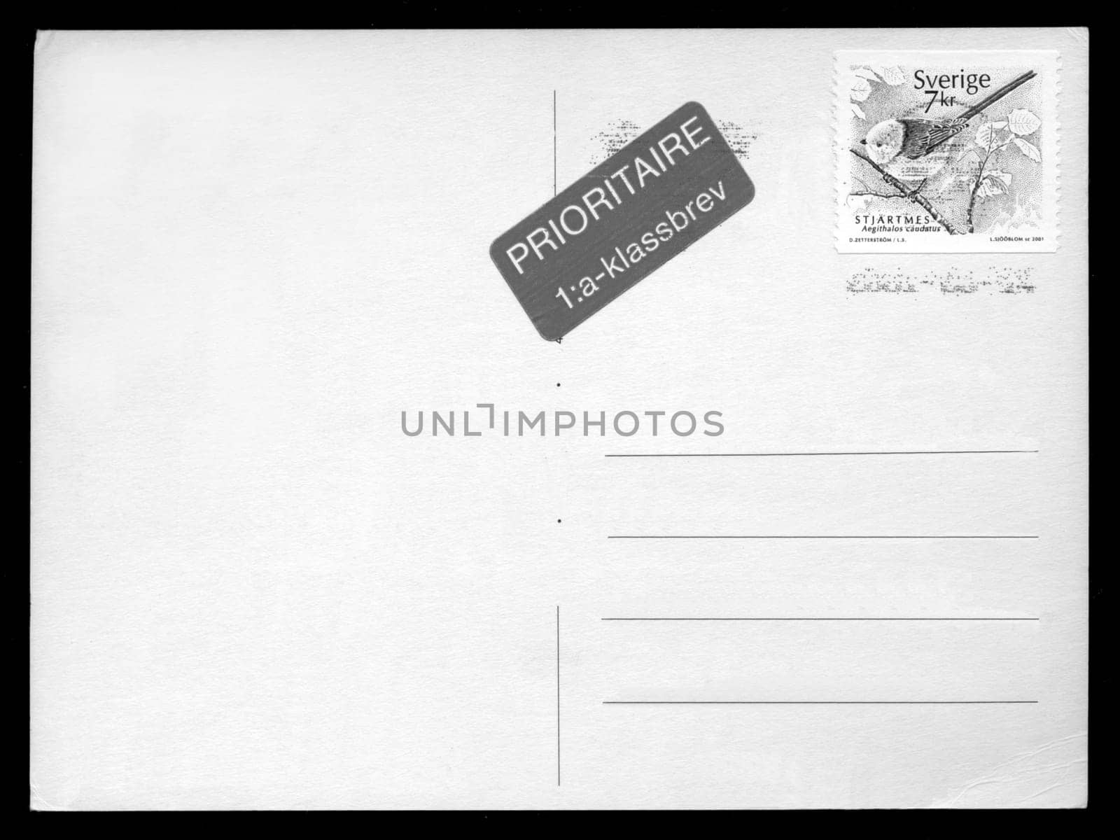 Blank postcard with stamp and postage meter