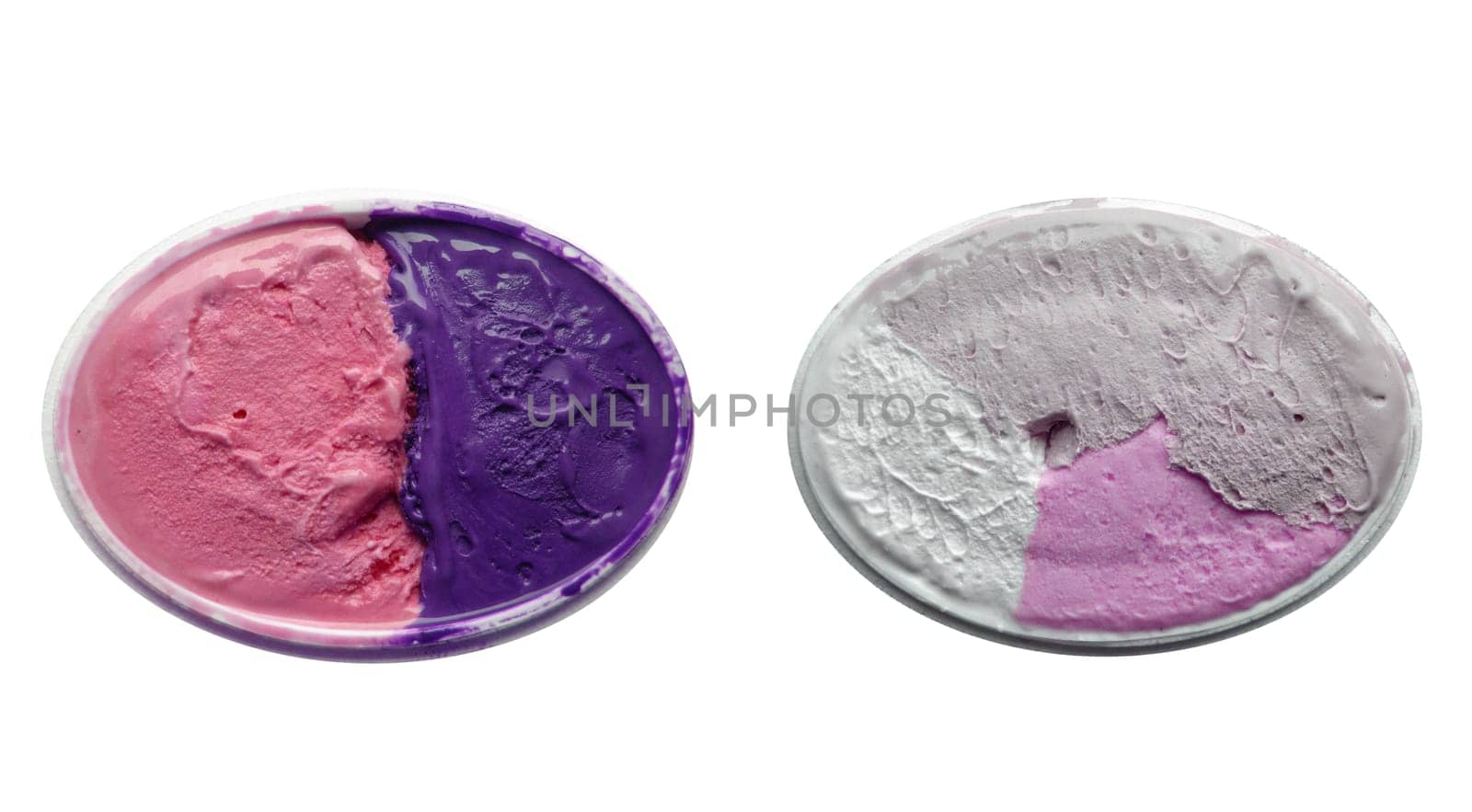 Strawberry and blueberry icecream isolated over a white background