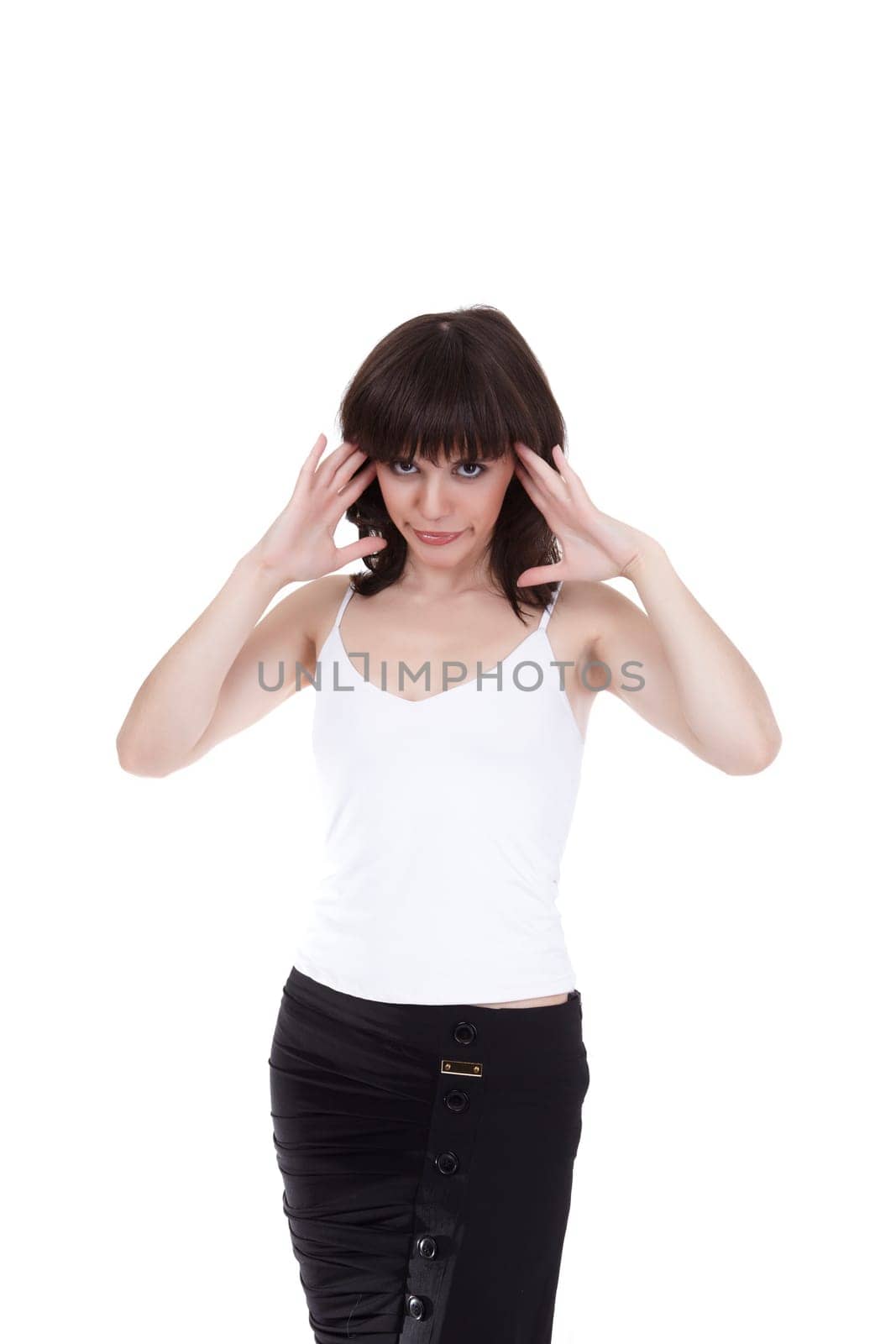 The beautiful girl has put hands to temples because of irritation from the interlocutor