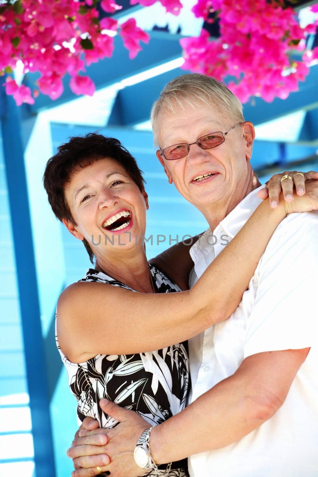 beautiful mature couple smiling looking at the camera