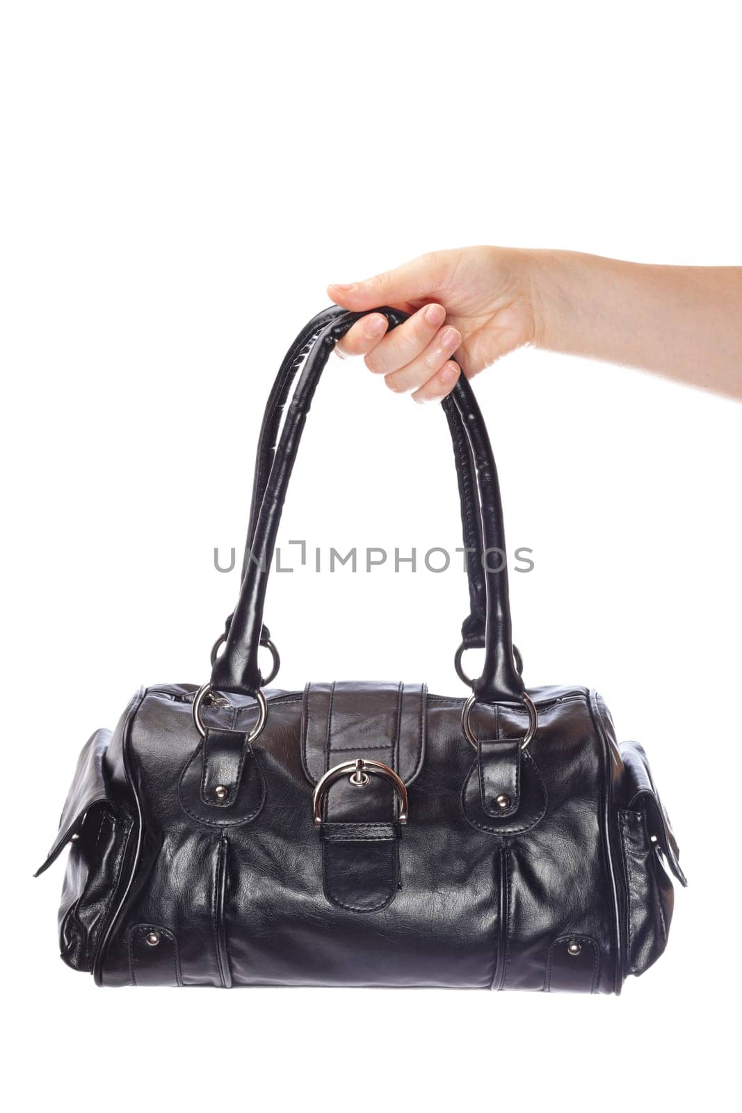 Holding a black handbag isolated on white background