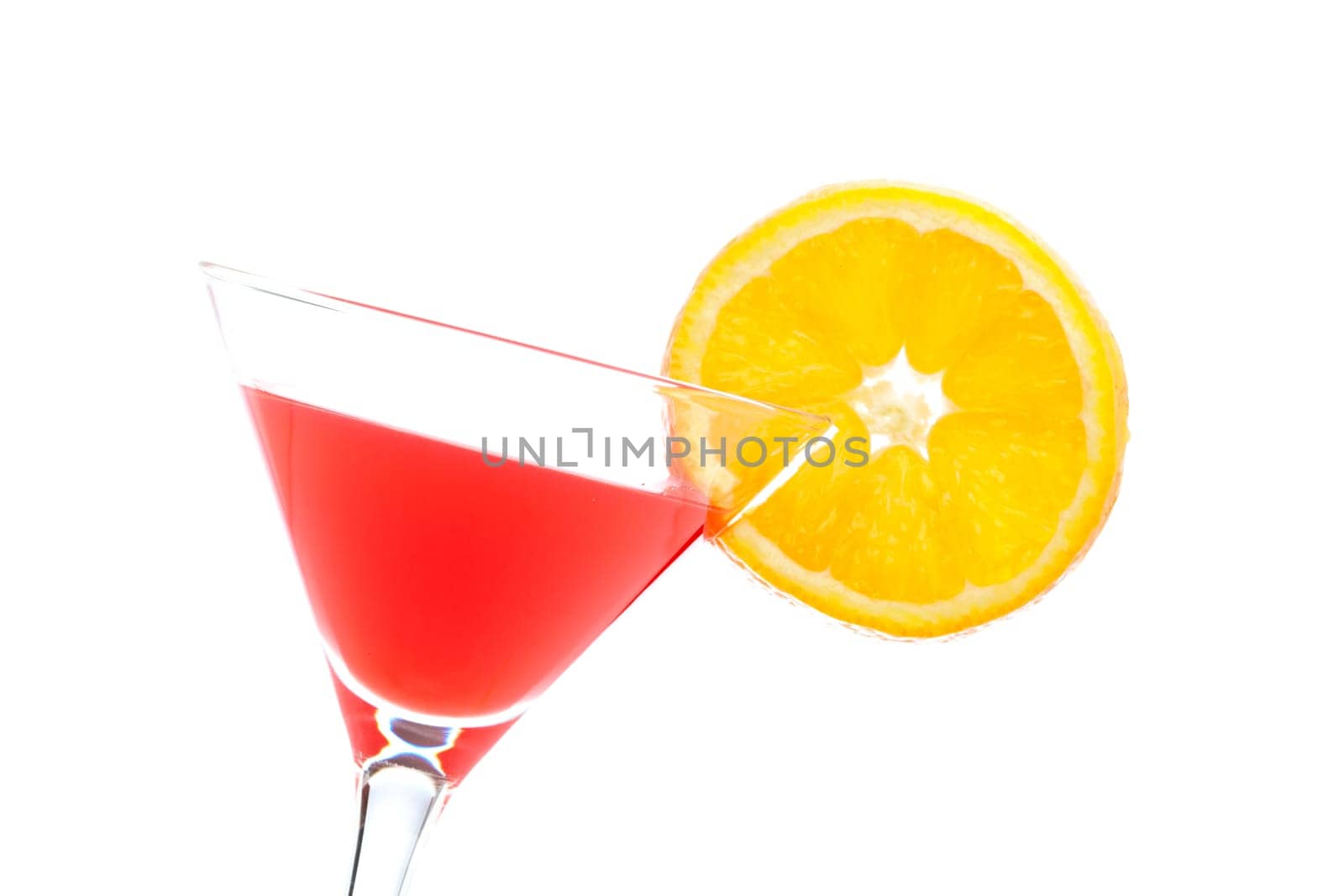A glass of fresh strawberry cocktail with orange slice isolated on white background