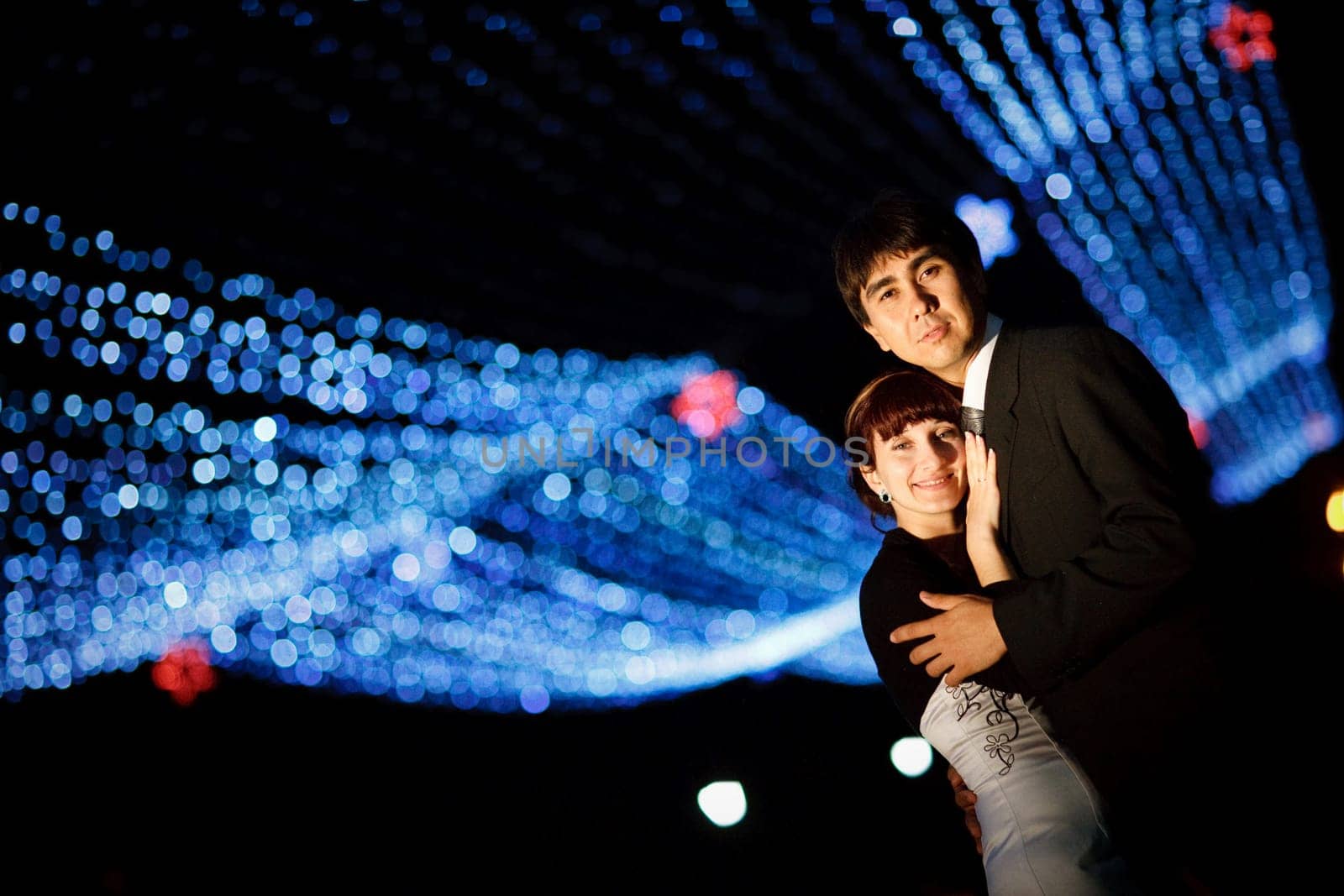 groom and bride at night