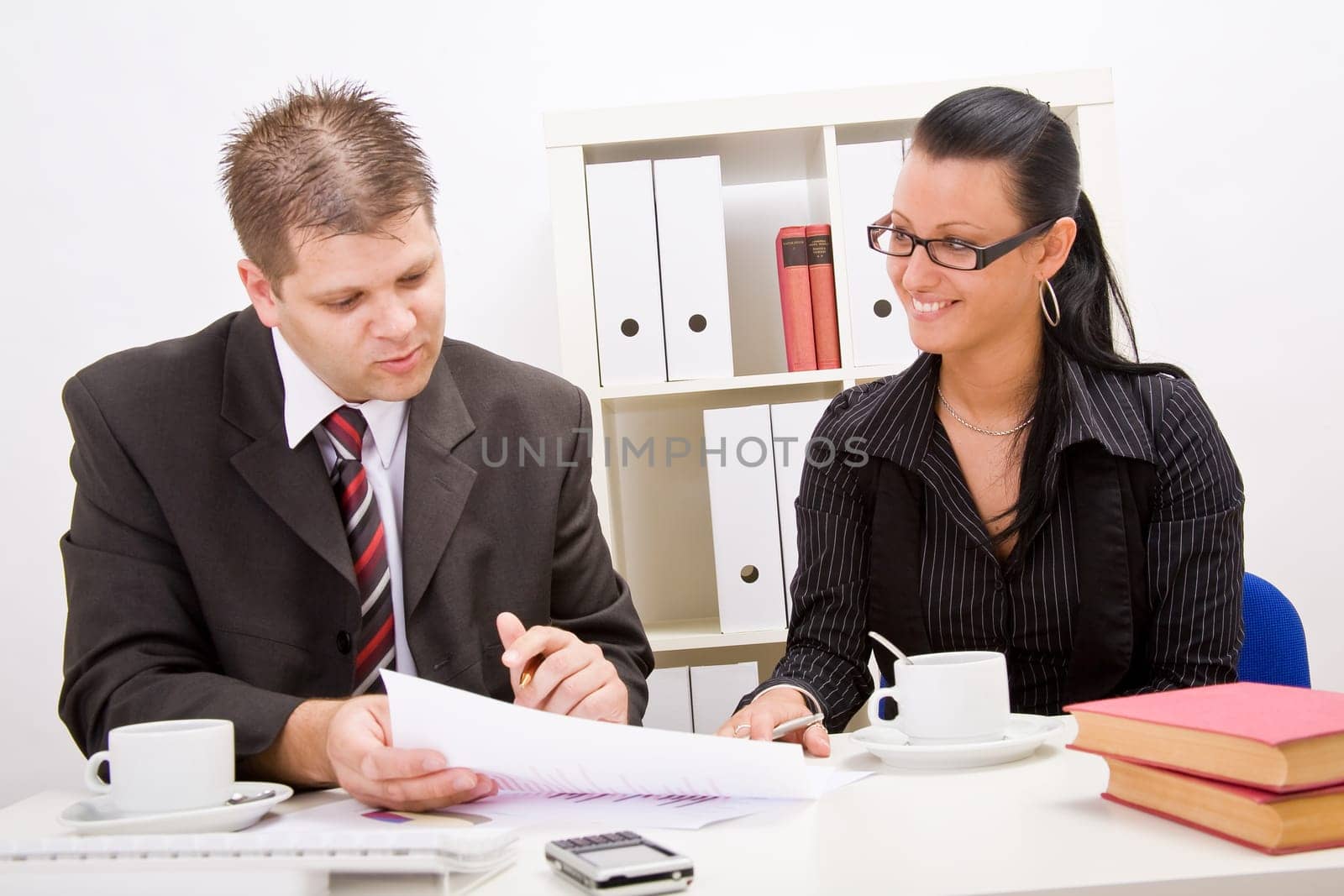 Business man and business woman working in office