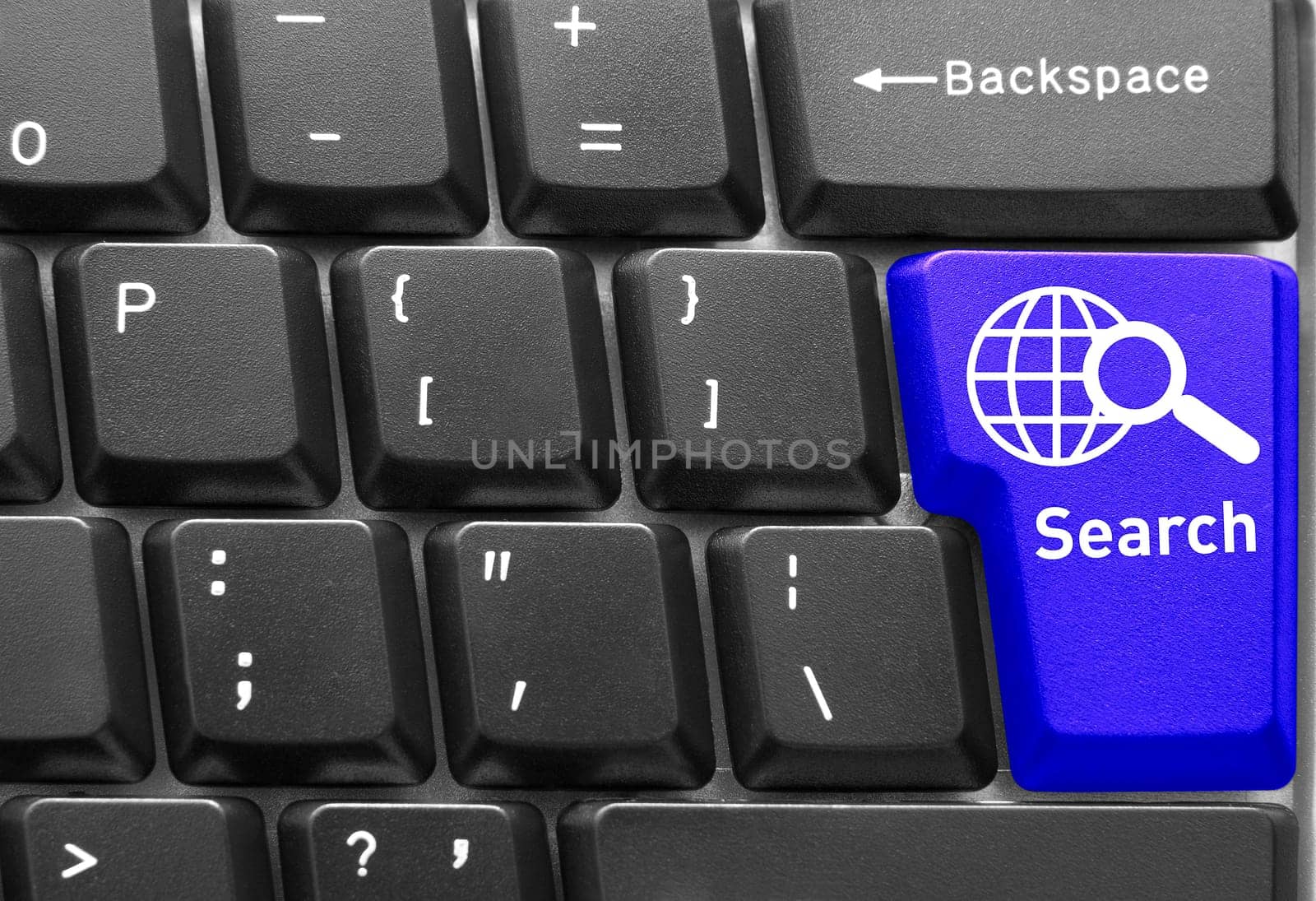 Close-up of Computer keyboard,  with blue "Search"" key"