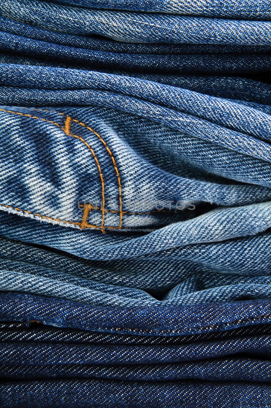 Stack of jeans paints