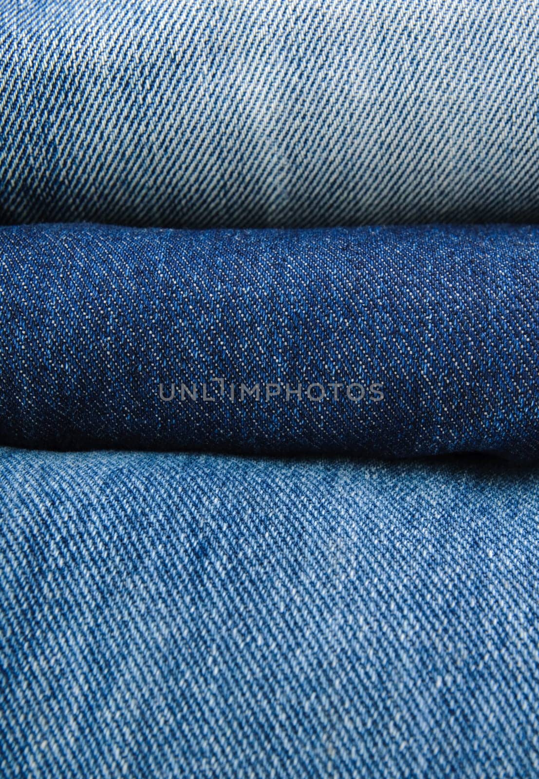 Stack of jeans paints