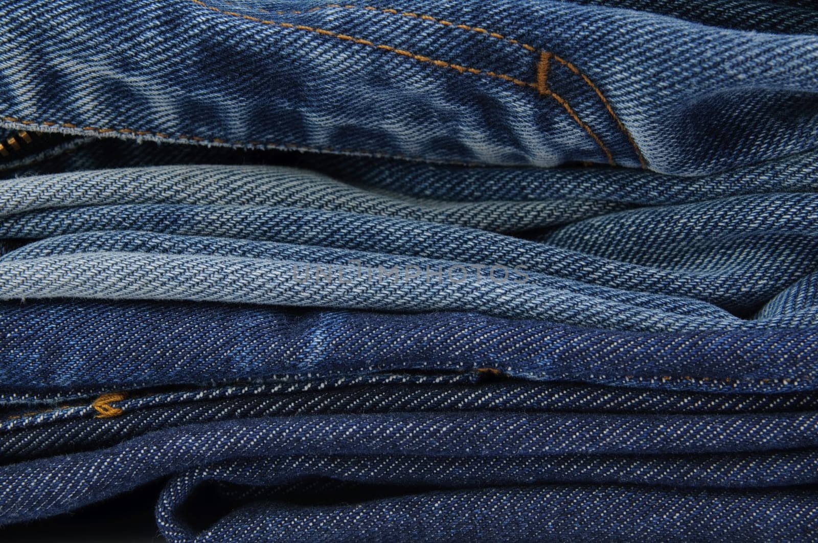 Stack of jeans paints