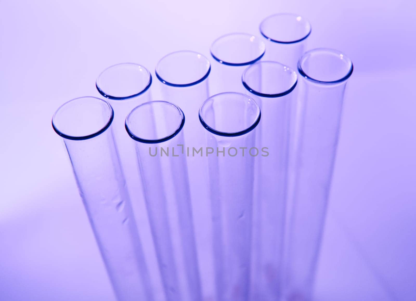 Test tubes on color background