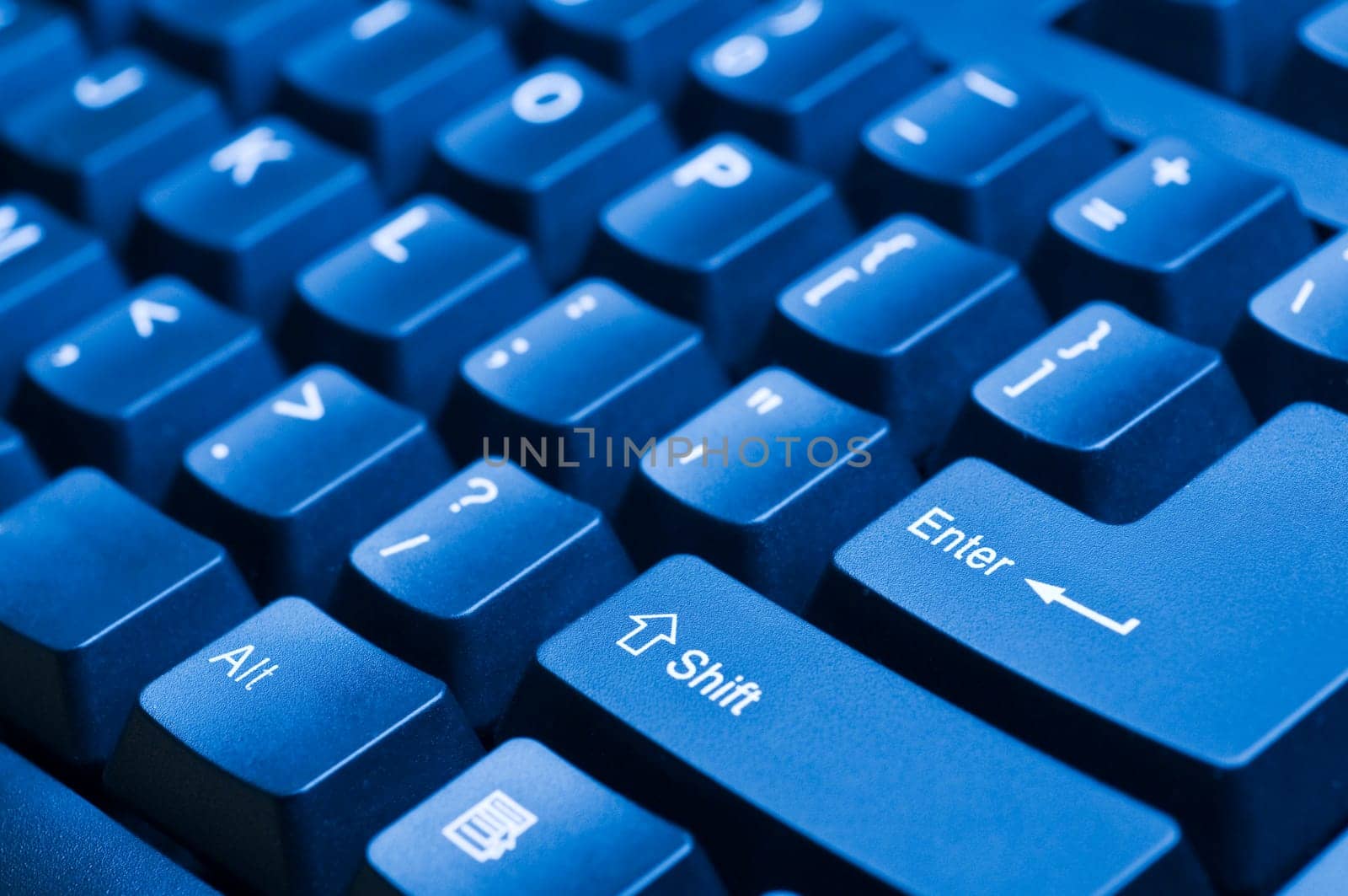 Macro view on the blue computer keyboard