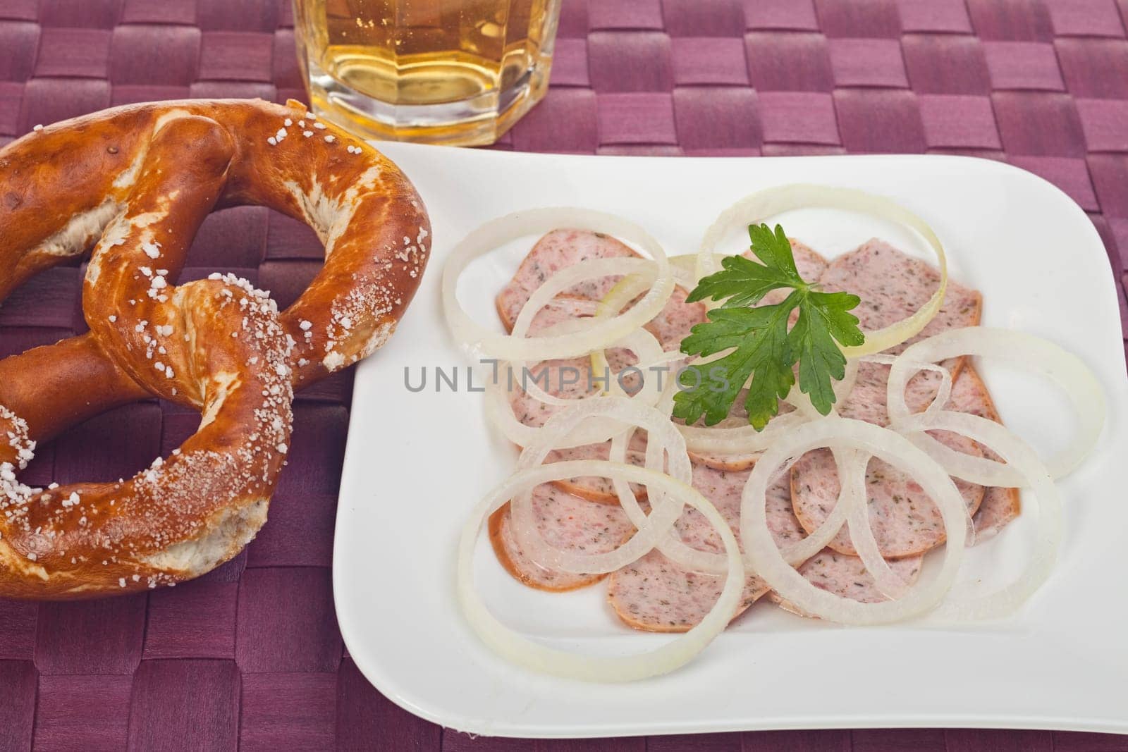 salad made of strips of sausage and onions