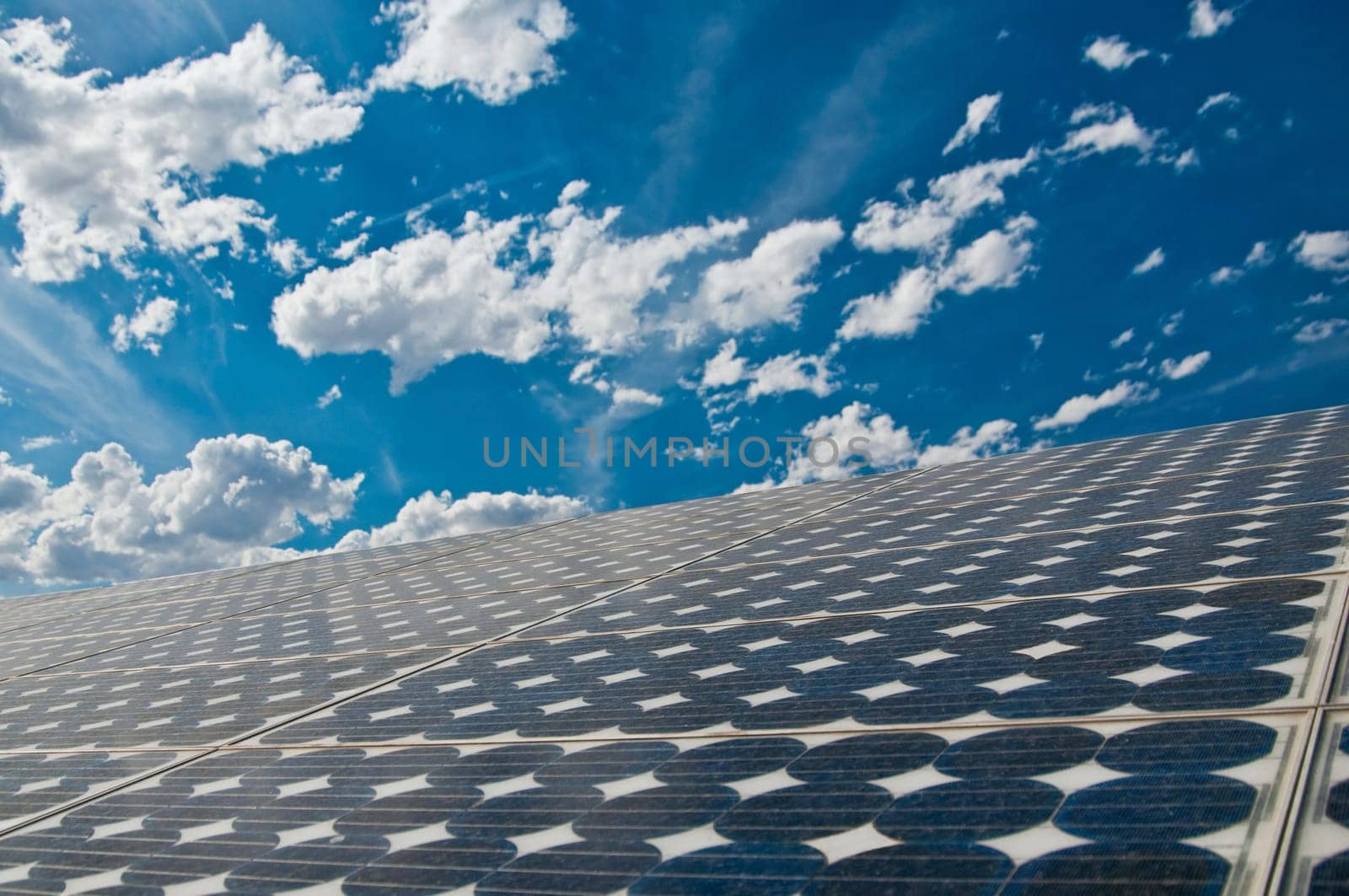 solar panel with beautiful blue sky and clouds in background