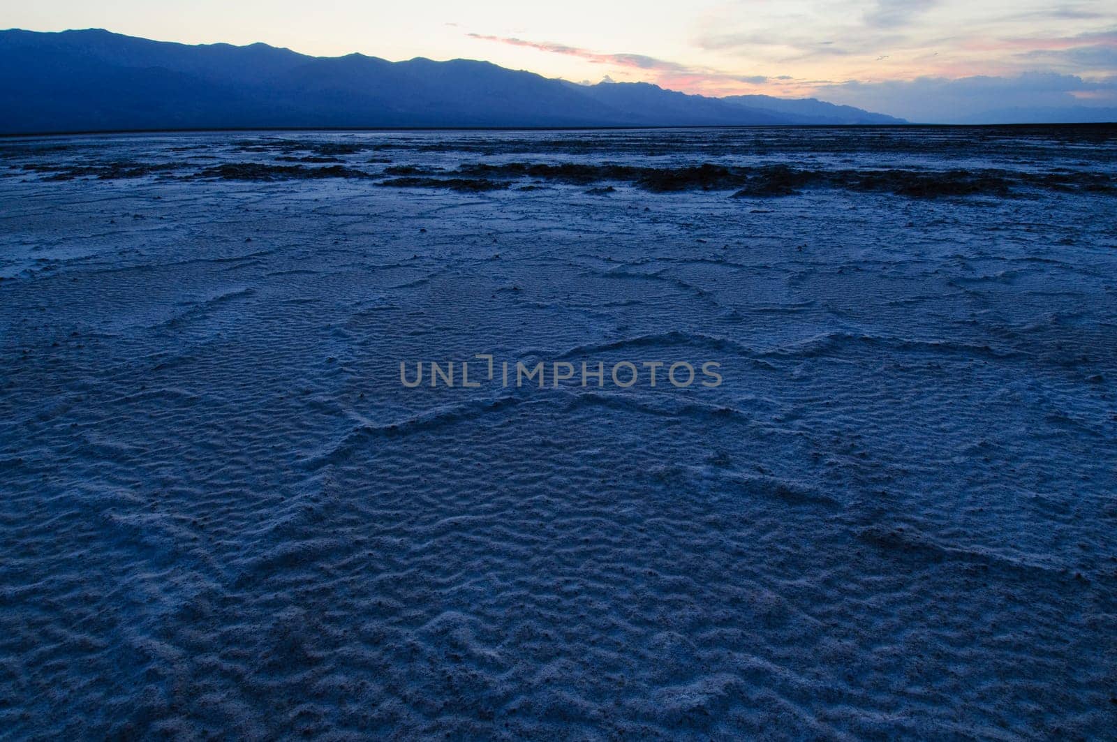 cracked desert earth in Death Valley National Park, CA
