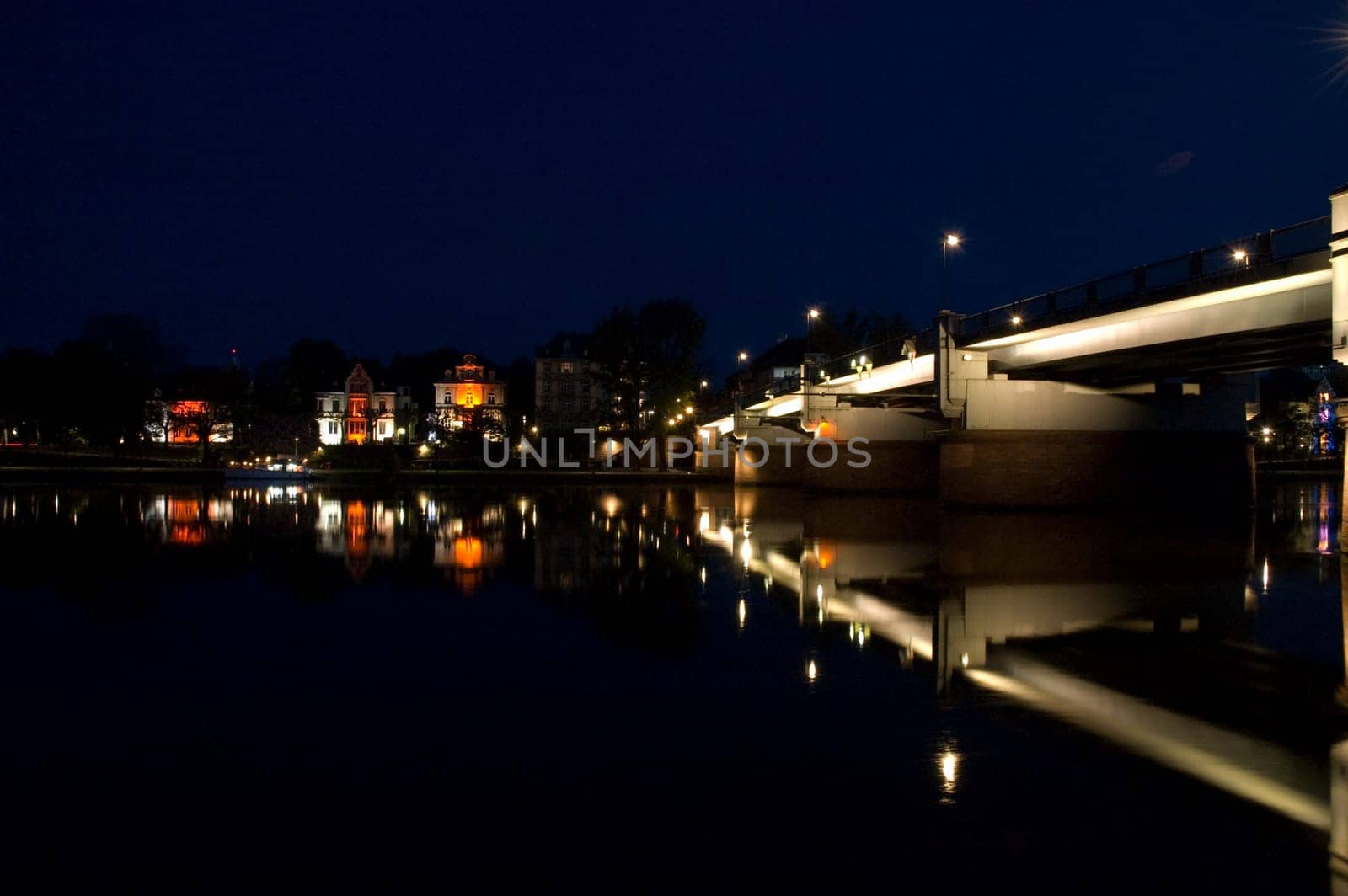 nightshot of frankfurt city including bridges and scyscrapers