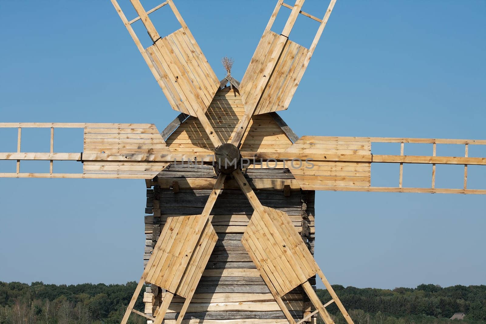 Detail of an old wooden windmill