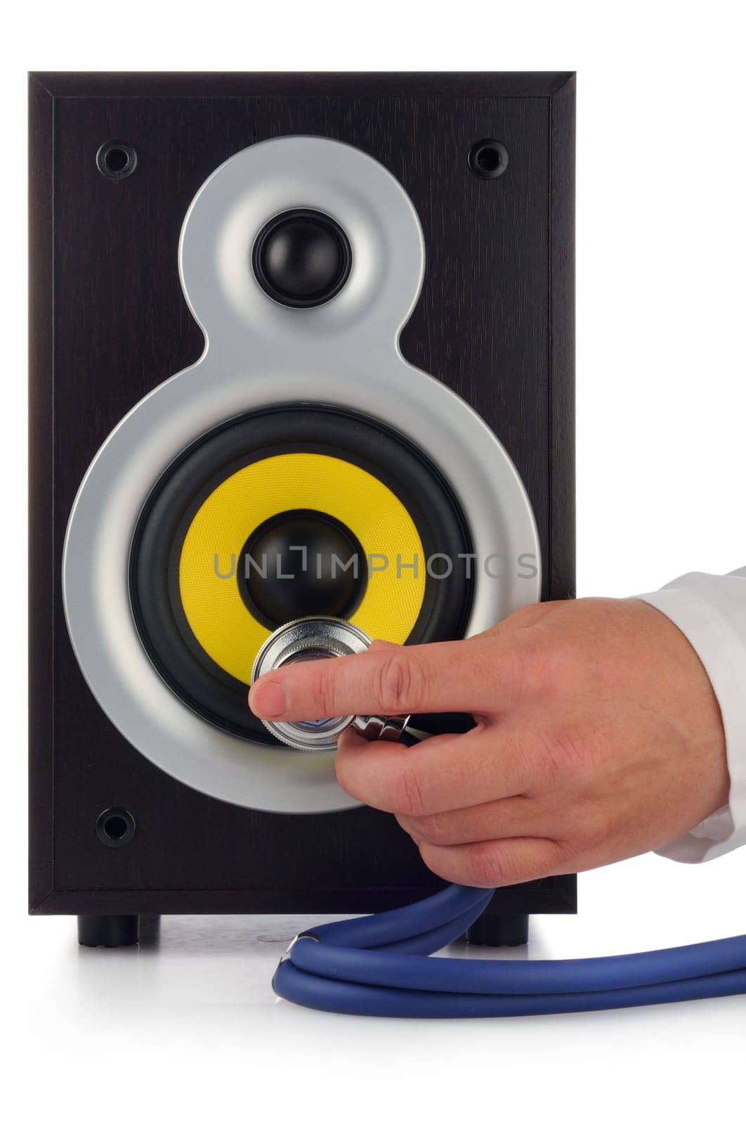 male hand, phonendoscope  and loud speaker on white