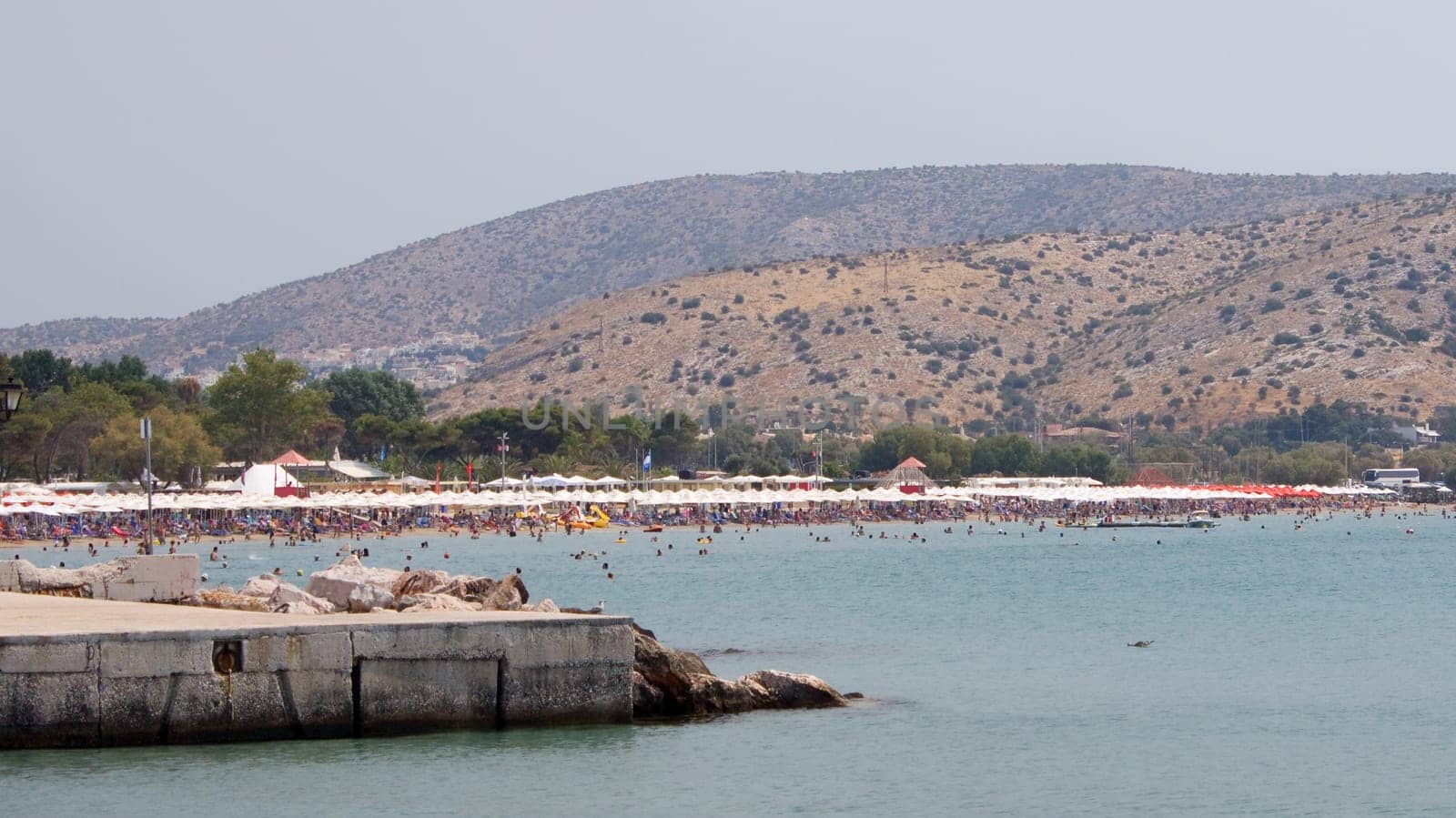 A remote view of the beach and waterfront in Varkiza, near Athens, Greece