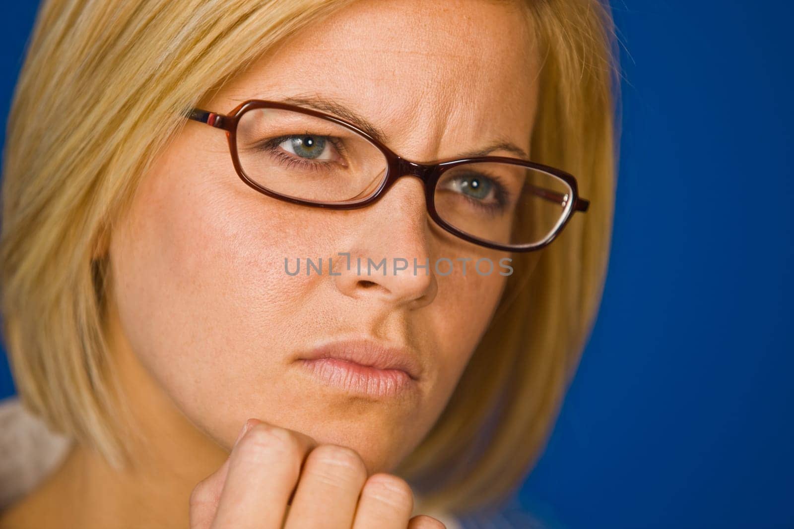 Confused, pretty young woman