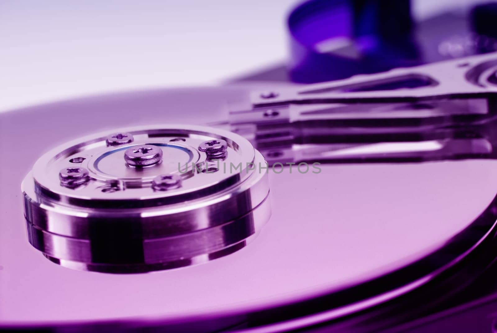 Hard disk on a violet background. Limited DOF.