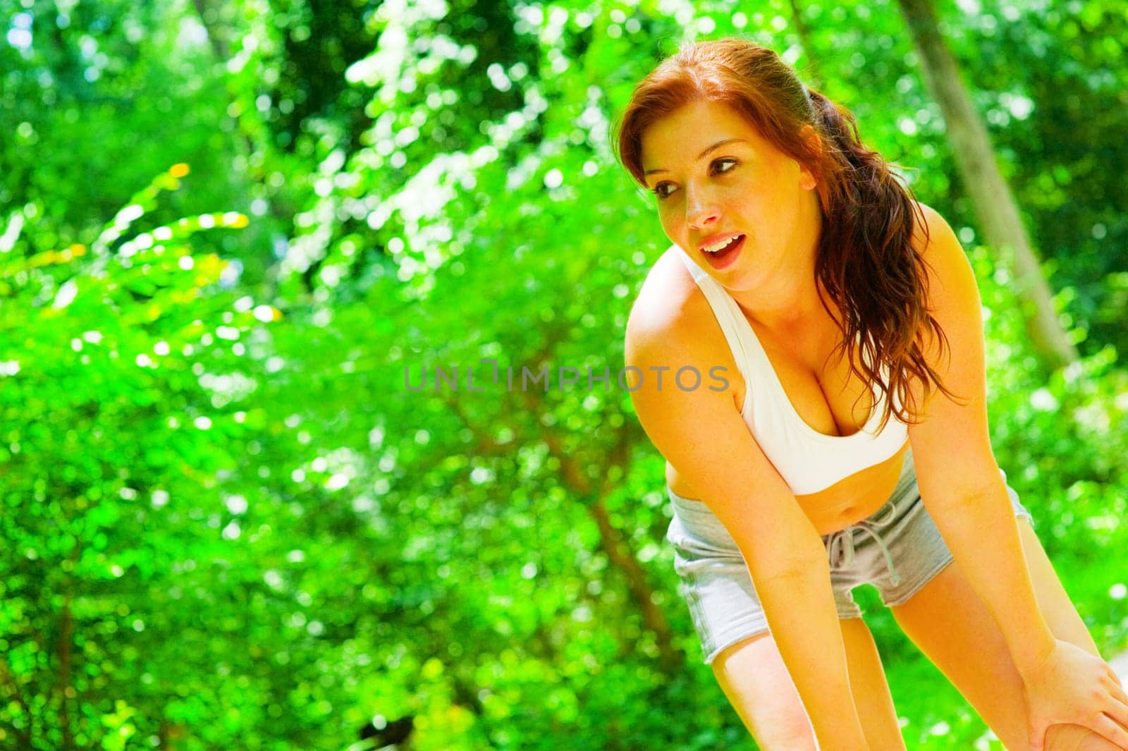 Woman runner exercising, from a complete series of photos.