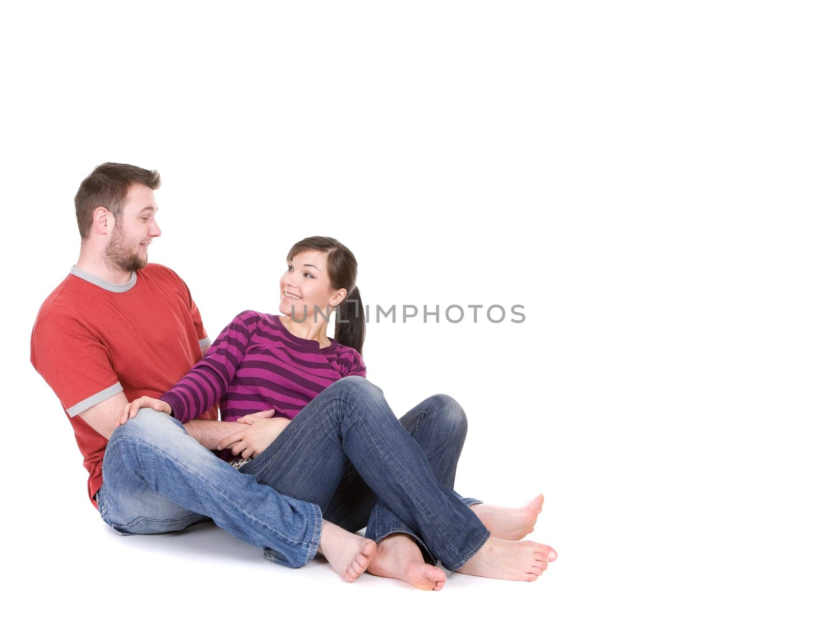 young loving couple together on white background