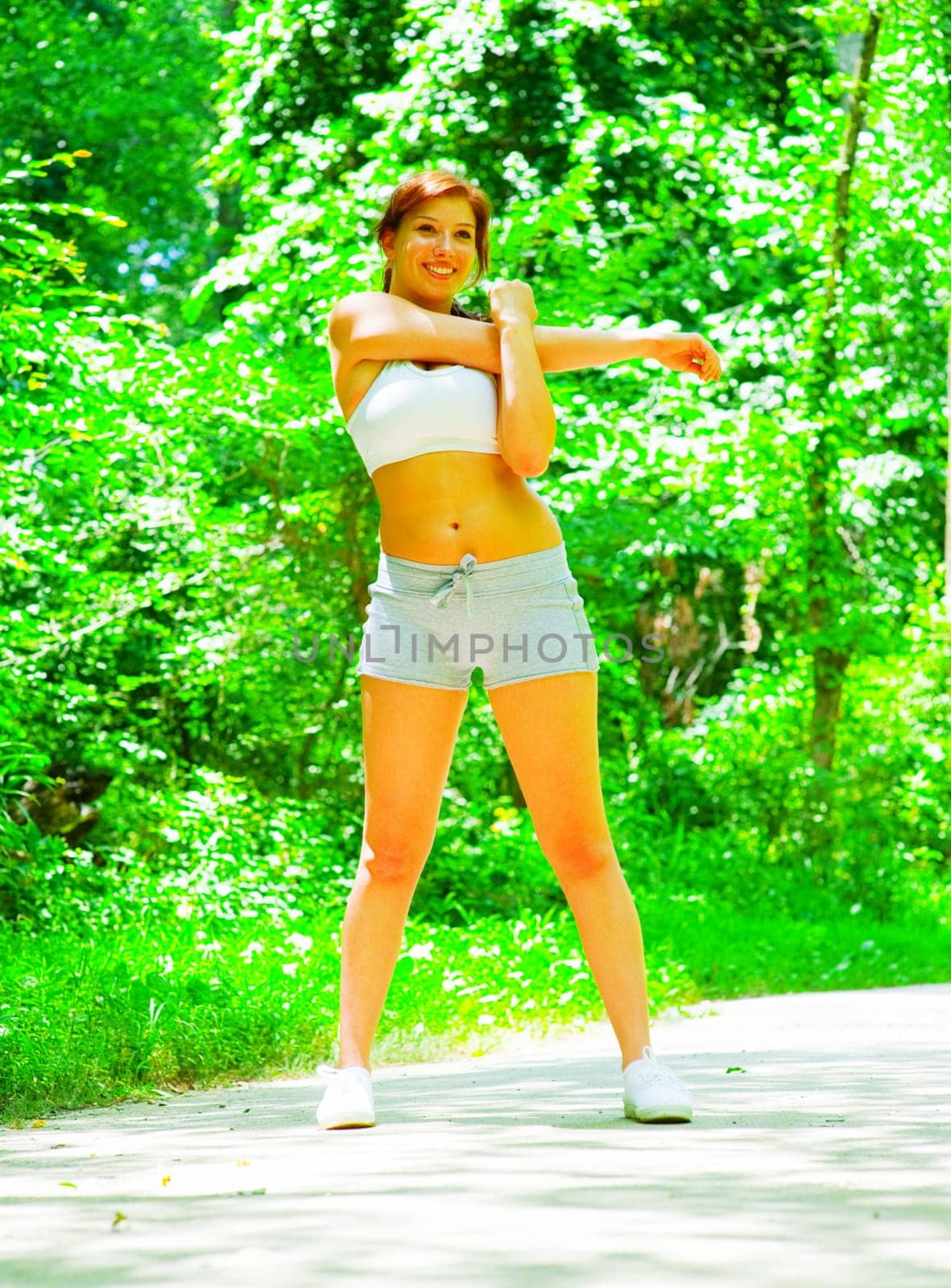 Woman runner exercising, from a complete series of photos.