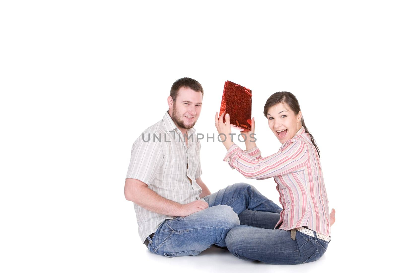 young loving couple together on white background