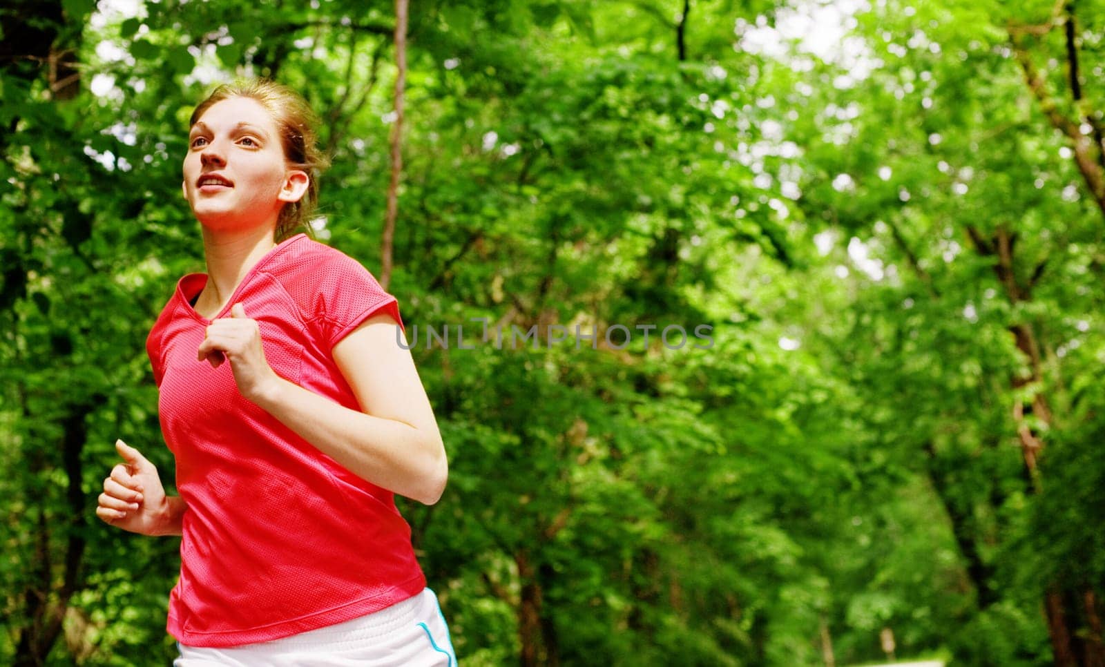Woman trail runner, from a complete series of photos.