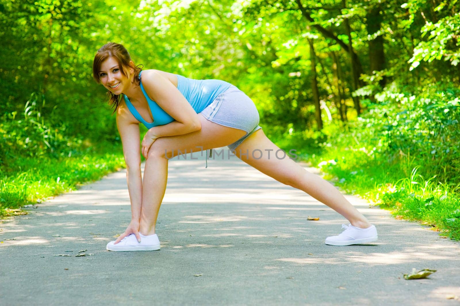 Young woman exercising, from a complete series of photos.