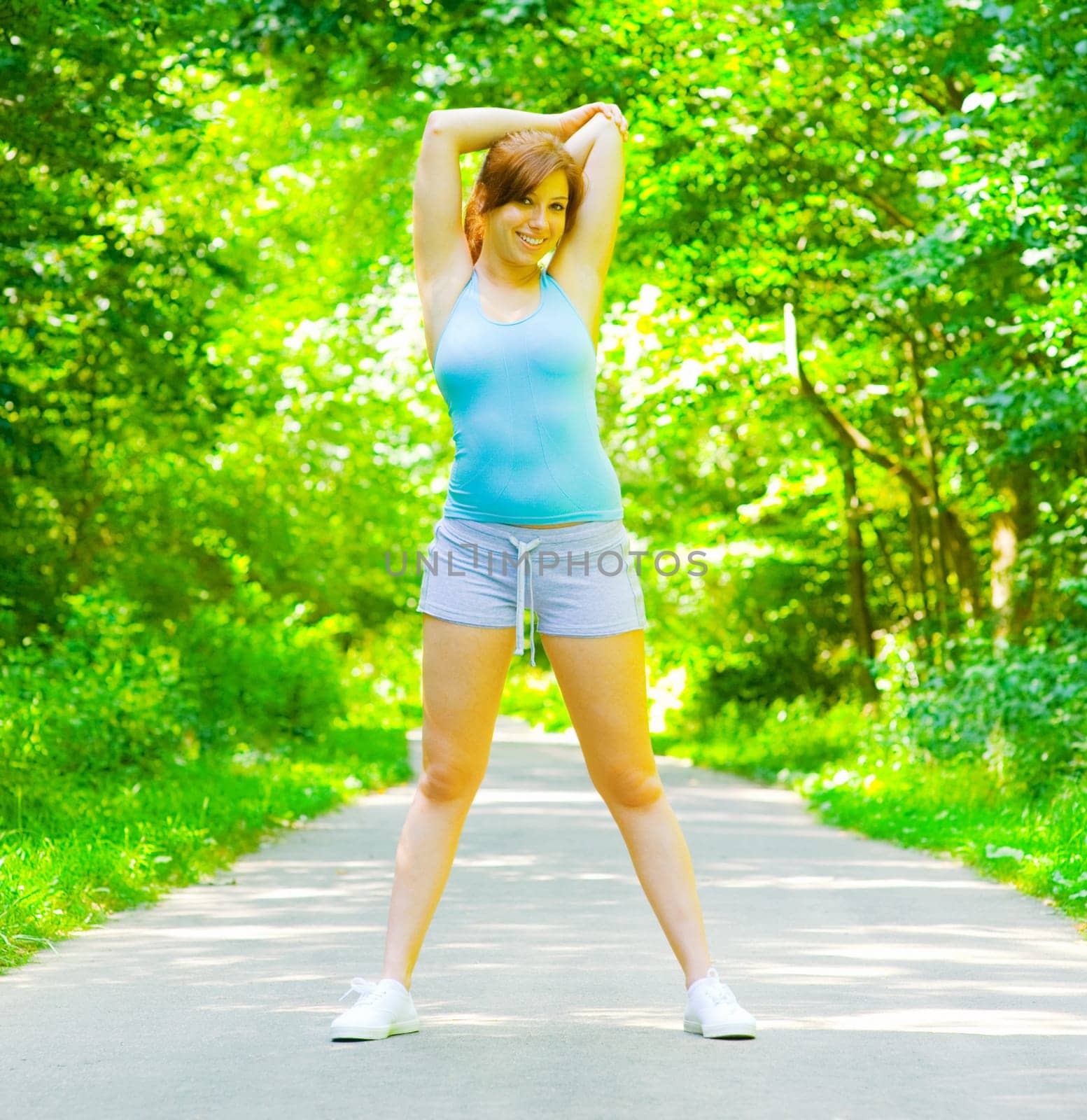Young woman exercising, from a complete series of photos.
