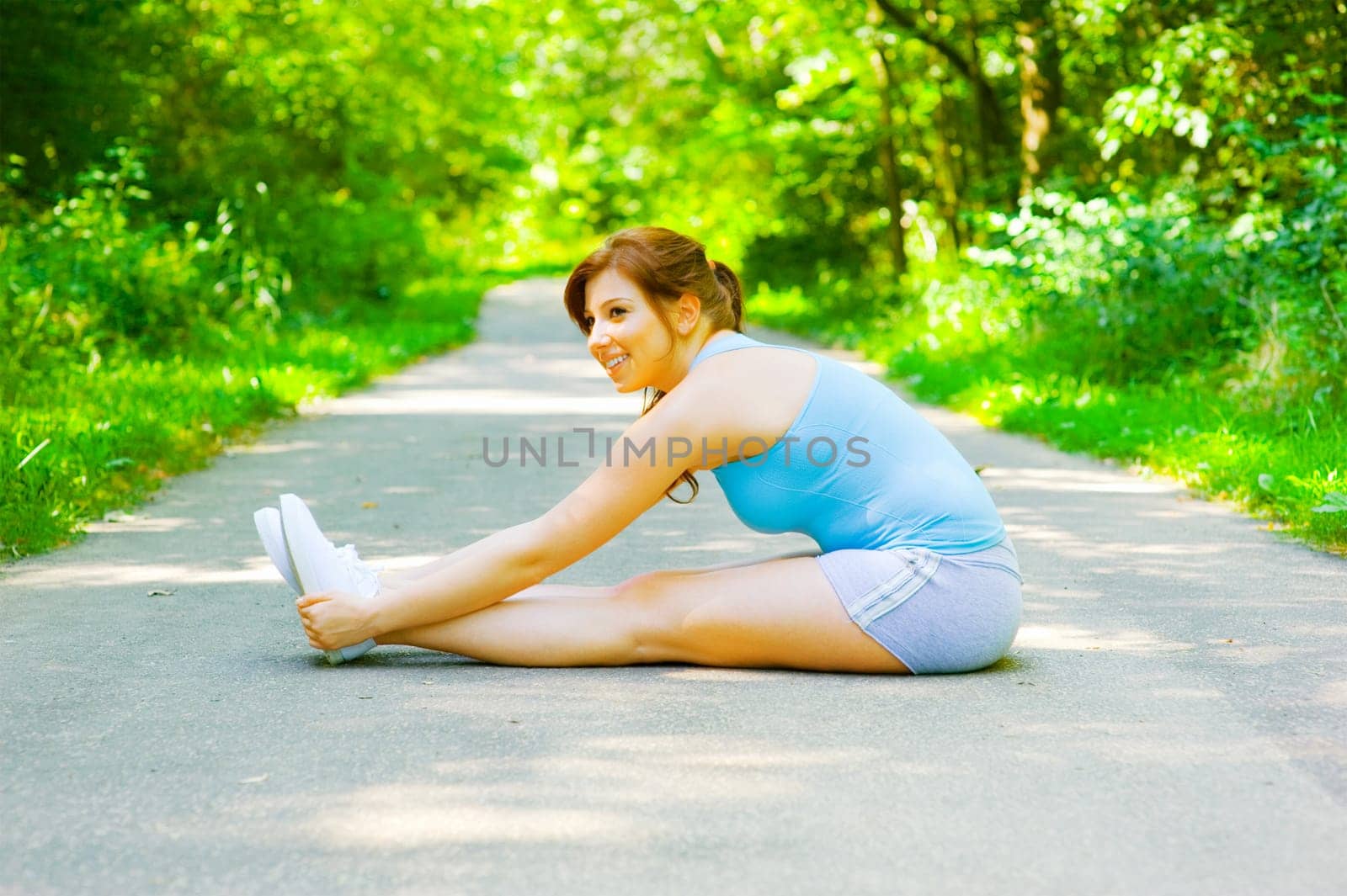 Young woman exercising, from a complete series of photos.