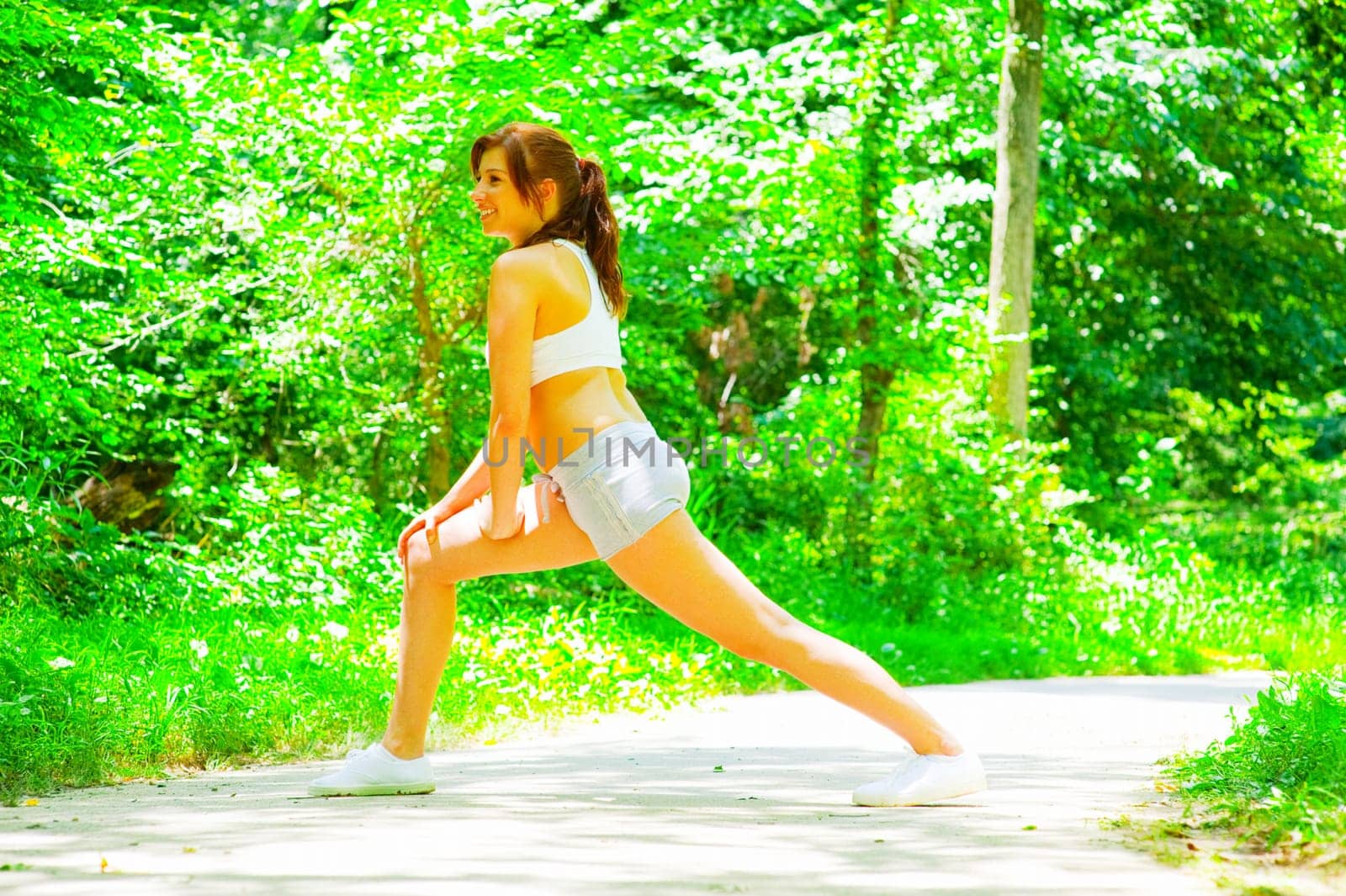 Woman runner exercising, from a complete series of photos.