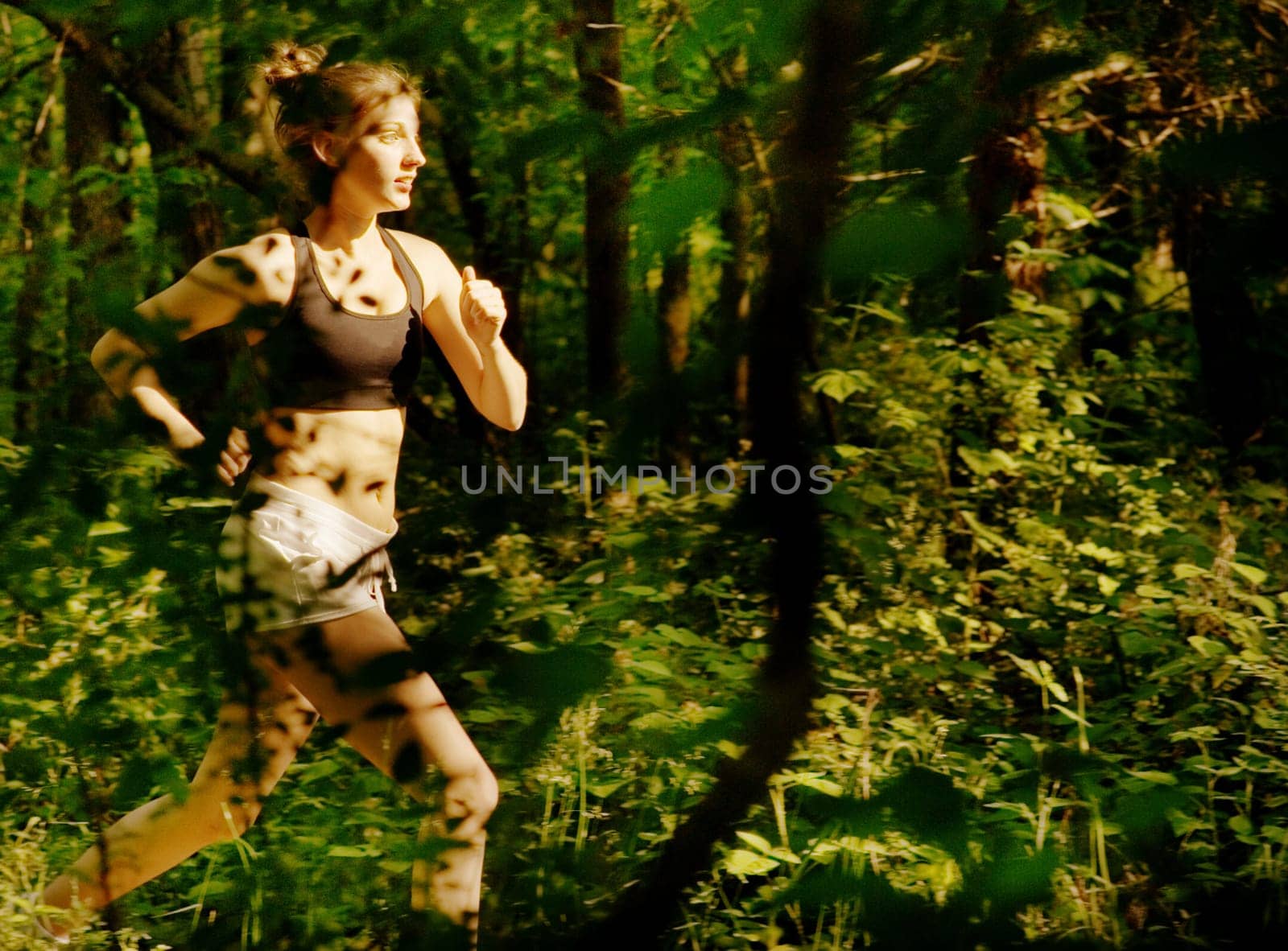 Woman trail runner, from a complete series of photos.