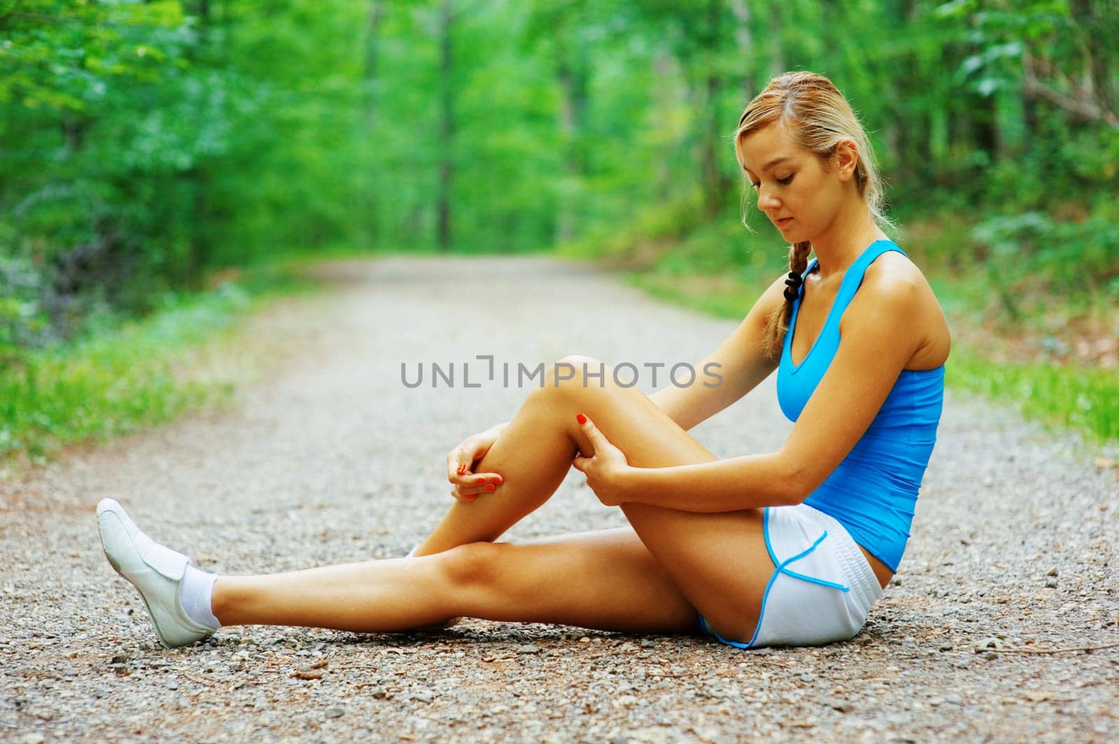 Woman runner exercising, from a complete series of photos.