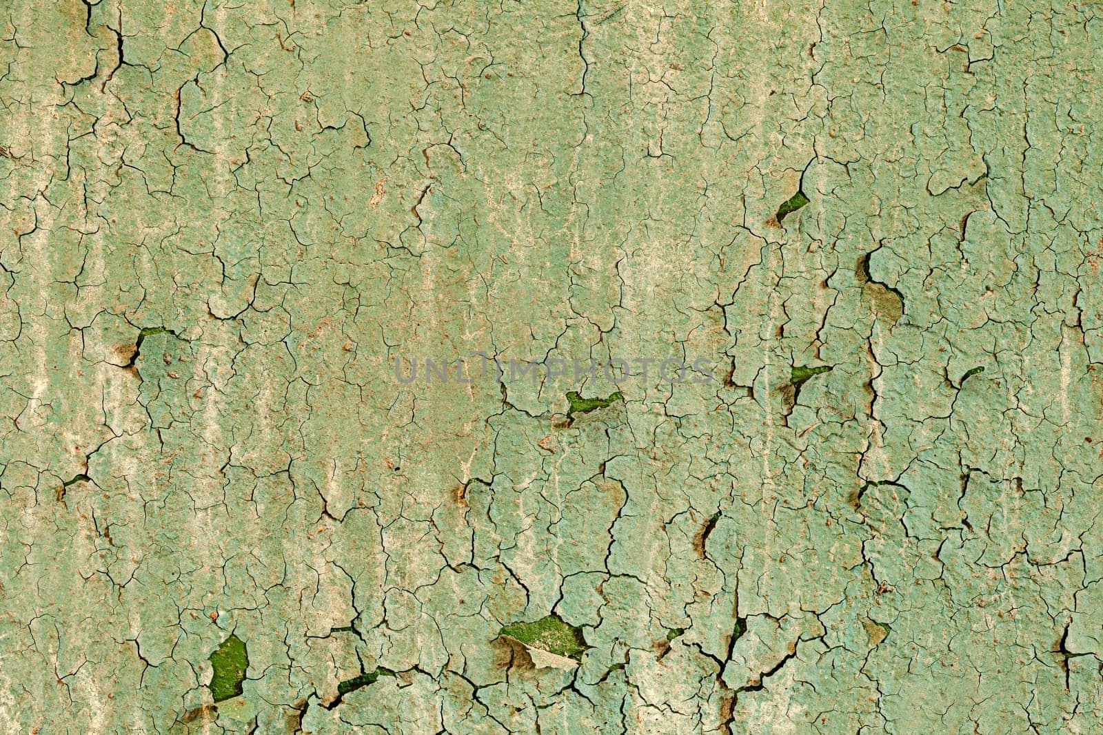 Old damaged paint on a concrete wall texture